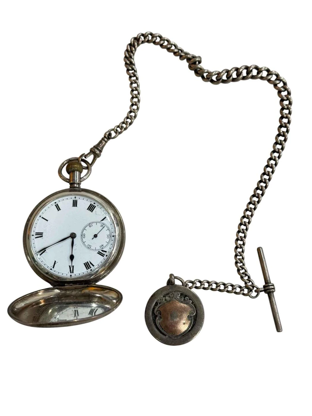 Silver pocket watch with albert and pendant.
