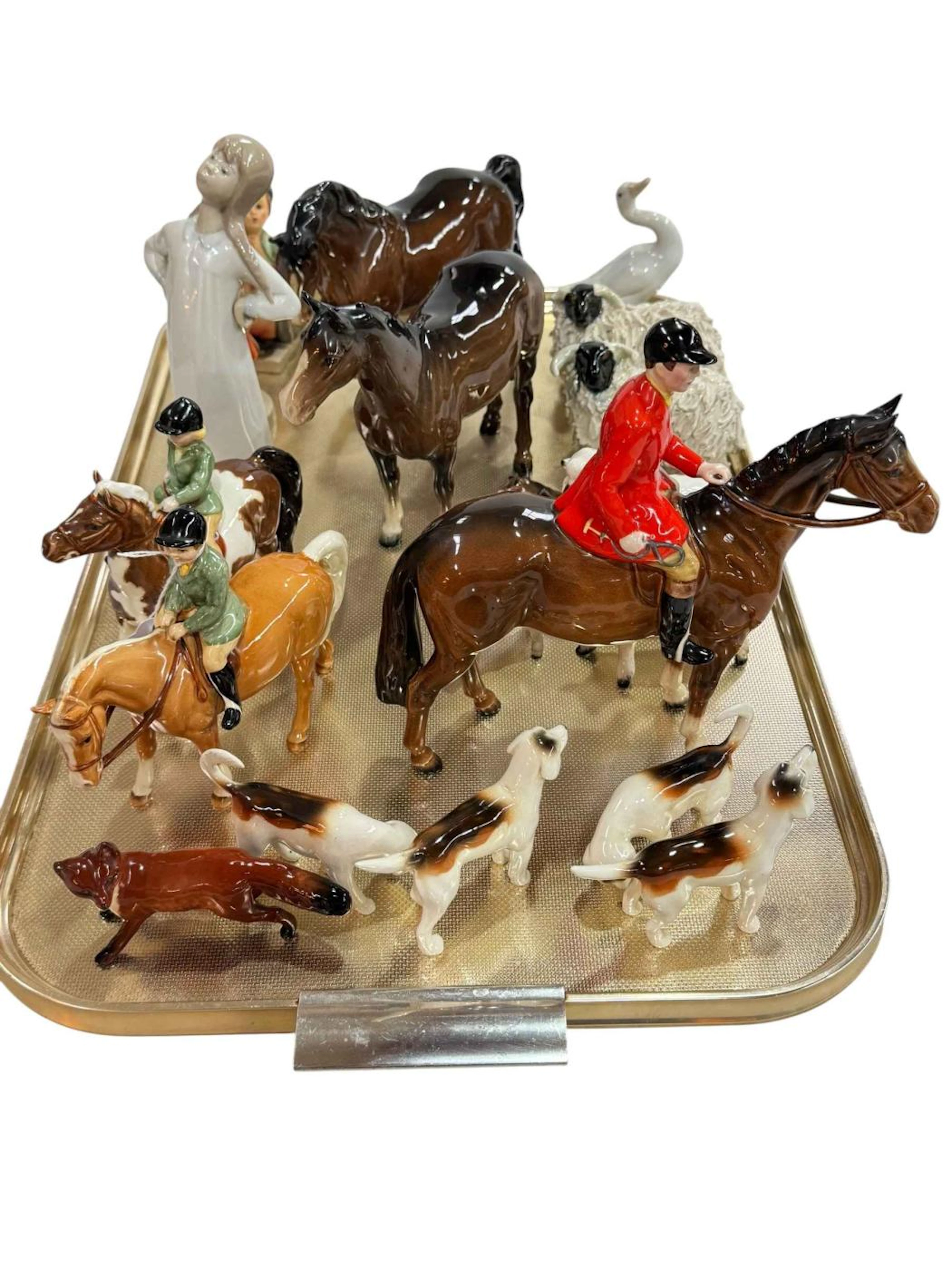 Beswick Huntsman, boy and girl on ponies, three horses, sheep, two