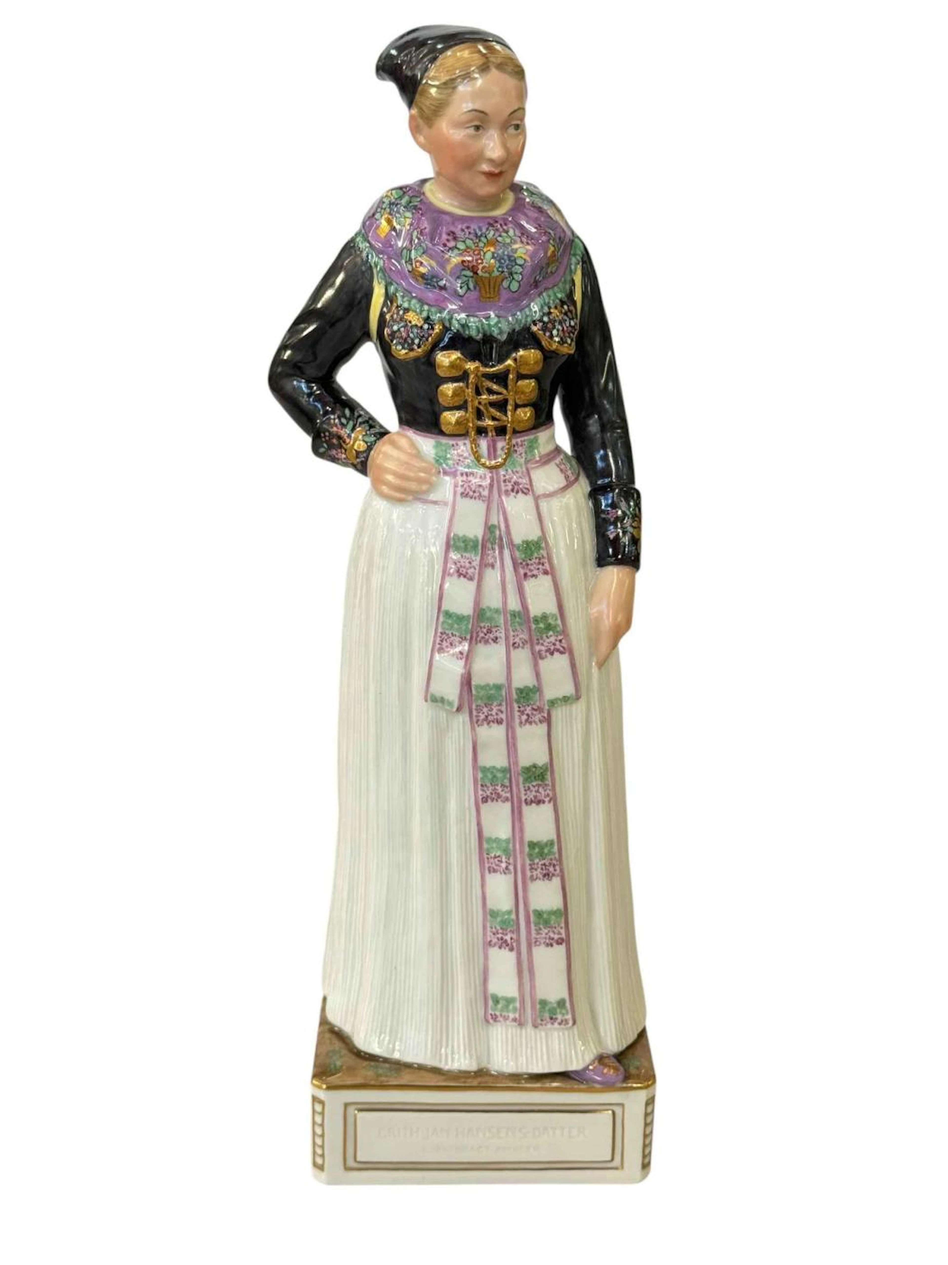 Royal Copenhagen figure of an Amager Woman in traditional cooks costume