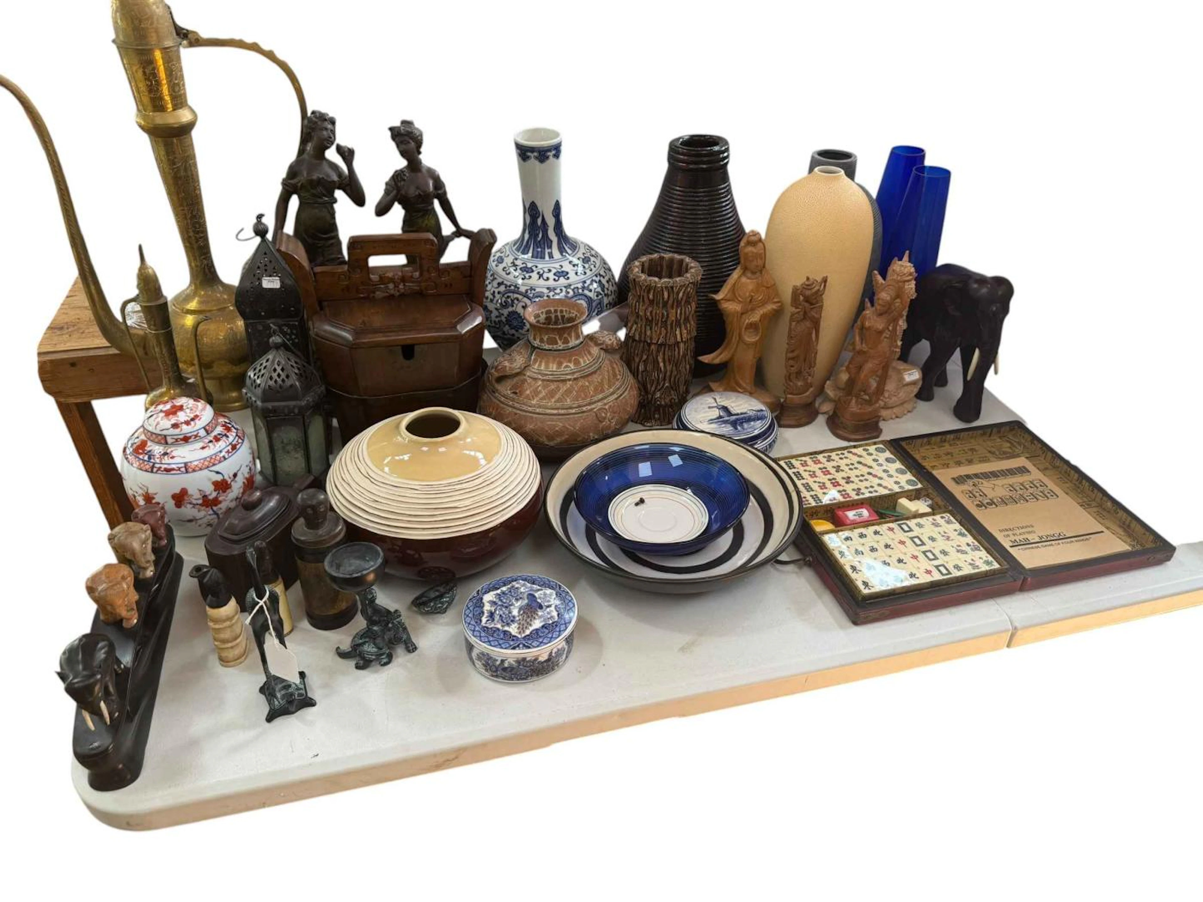 Collection of Oriental and tribal ceramics, figures and collectables
