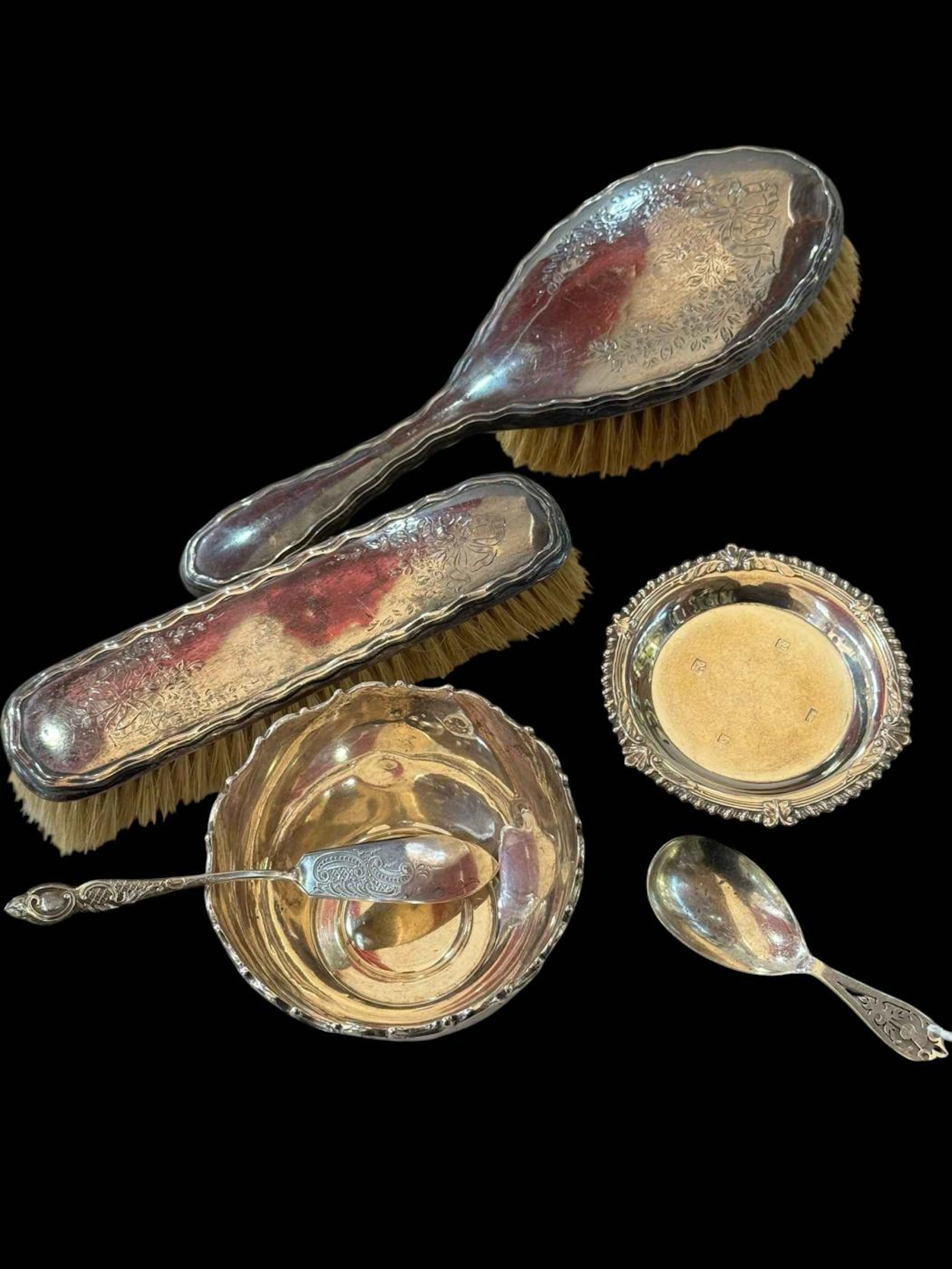 Silver sugar basin, pin tray, butter knife, caddy spoon, and two silver