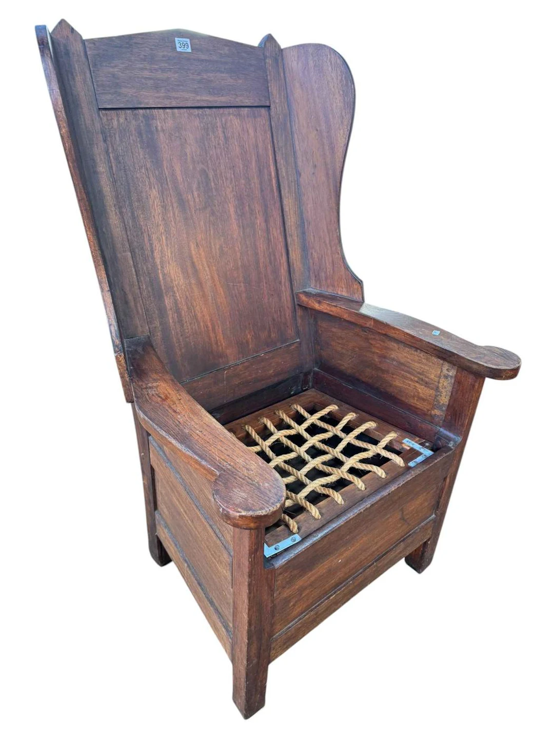 Antique lambing chair with rope seat and fielded panel back.