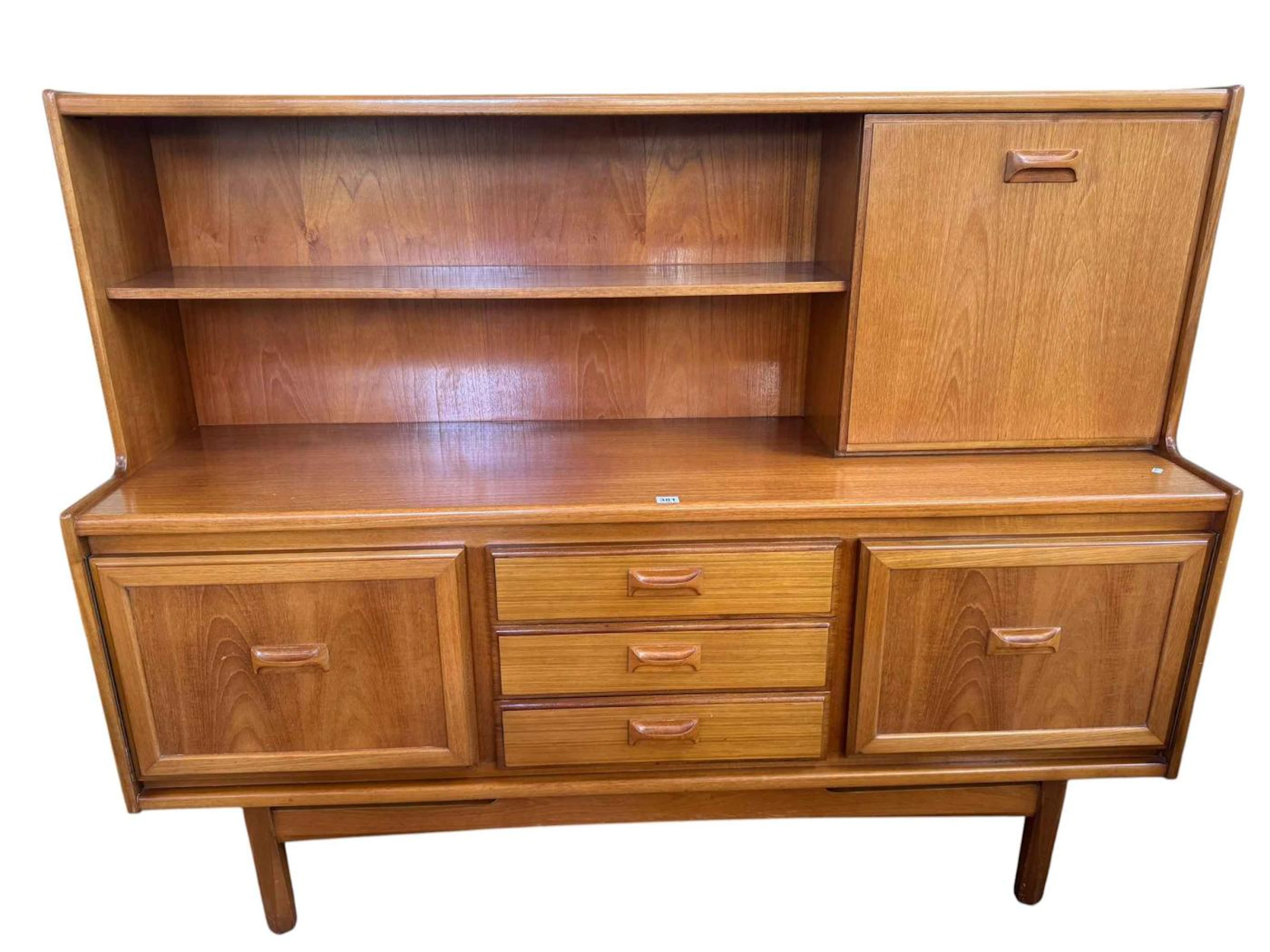 William Lawrence mid century teak sideboard featuring a top drop down