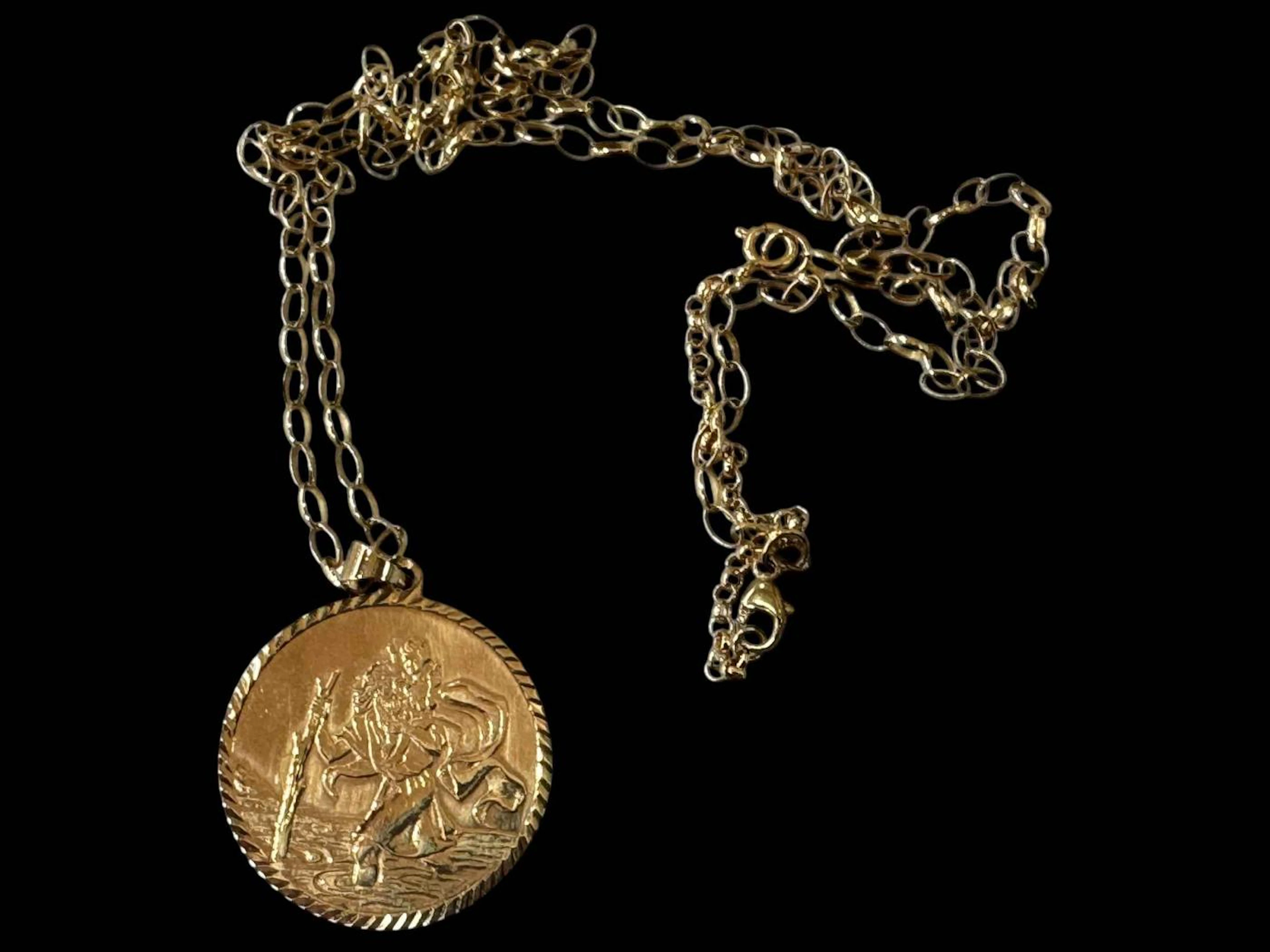 9 carat gold St Christopher pendant and chain.