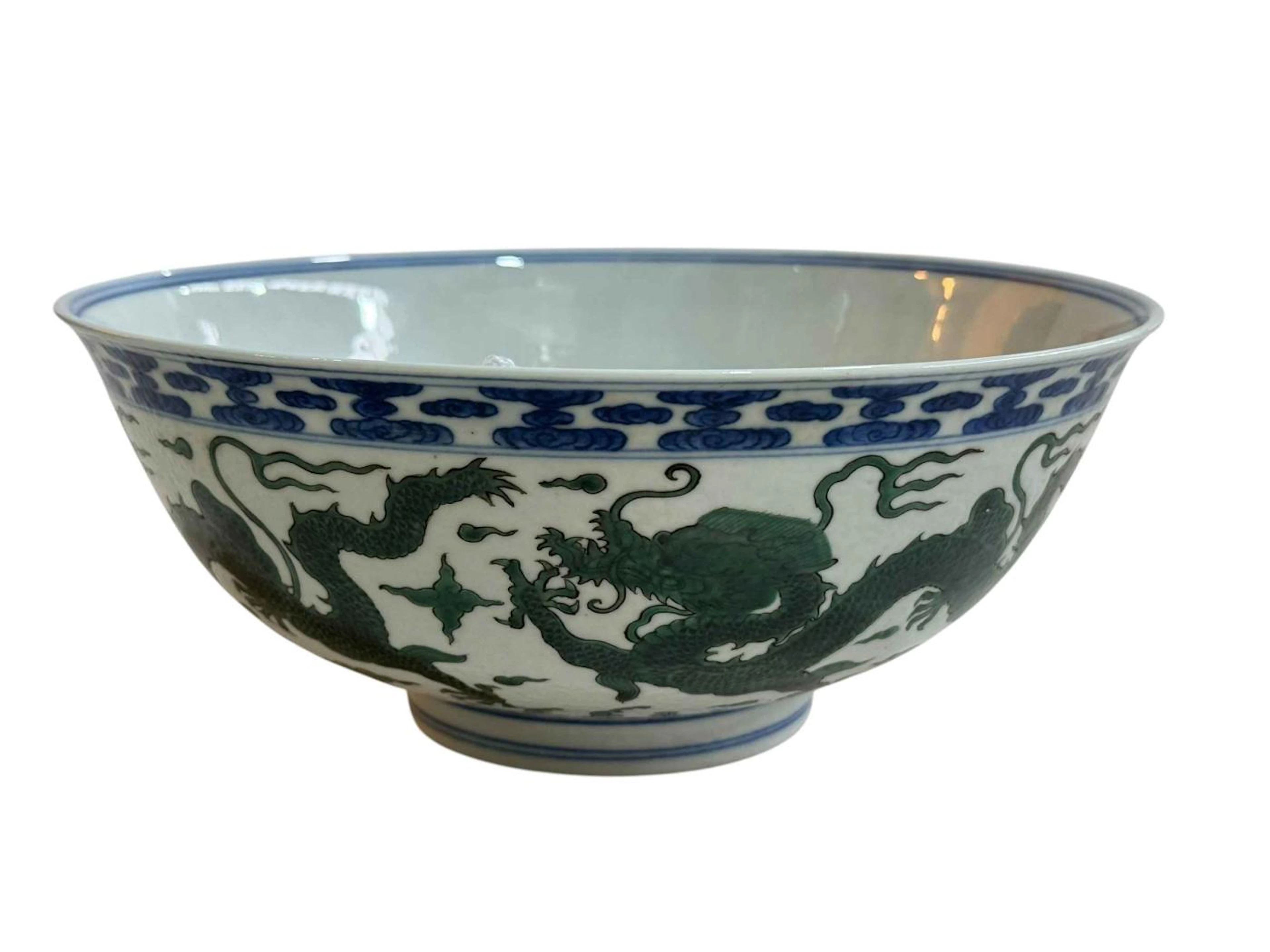 Chinese blue and white bowl decorated with green dragons with Qianlong