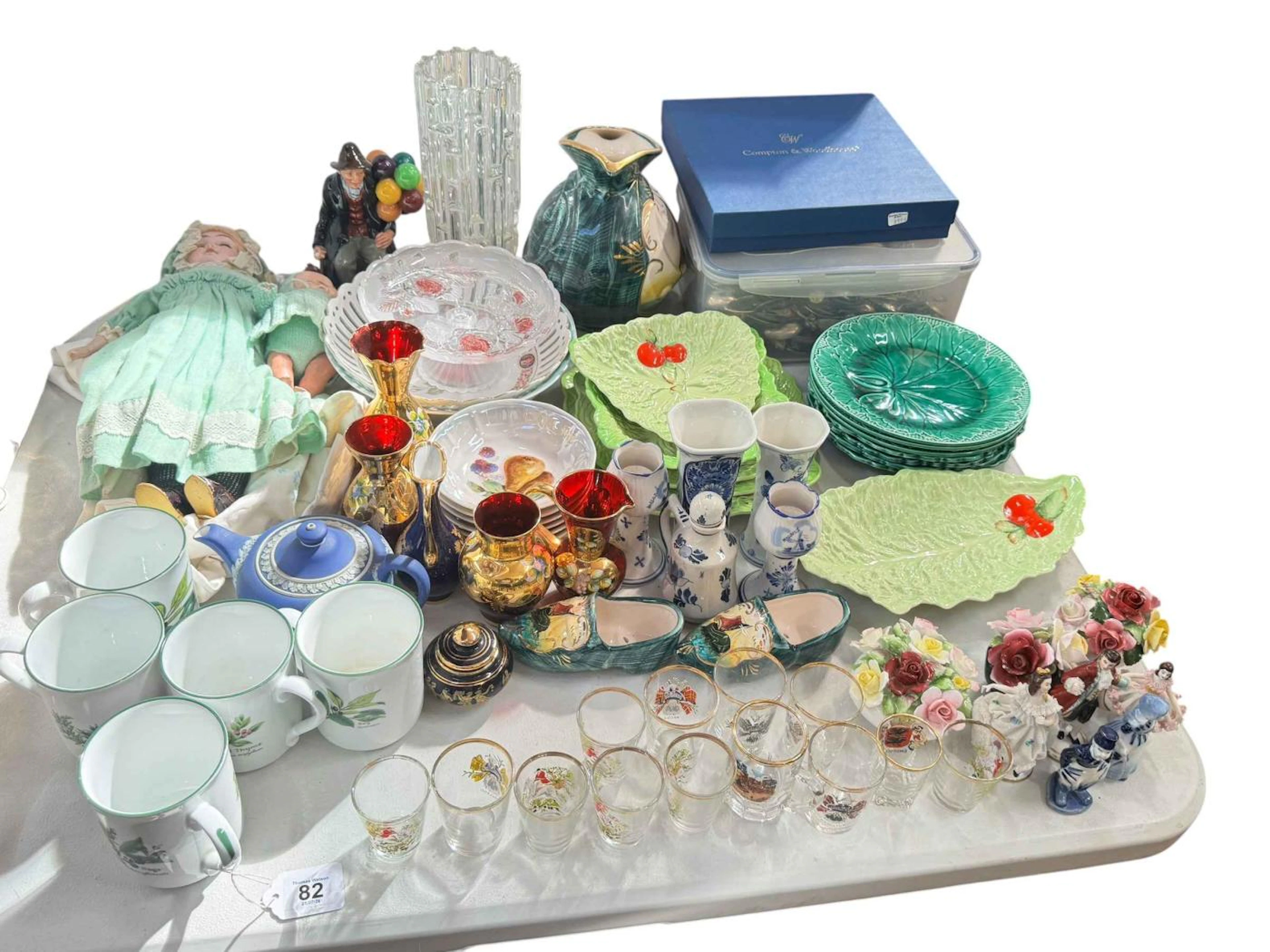 Collection of assorted glass and china, souvenir spoons, bisque head