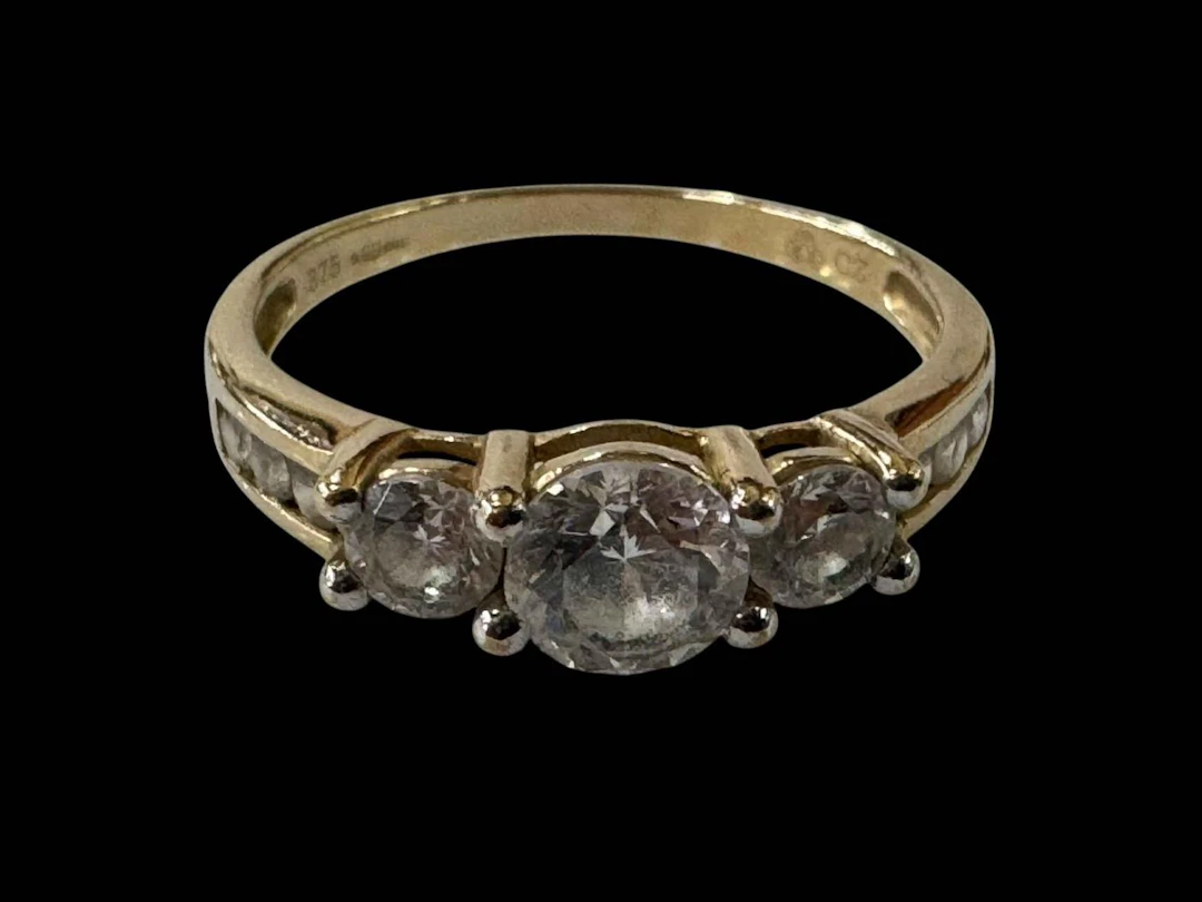 Cubic Zirconia three stone 9 carat gold ring, size U.