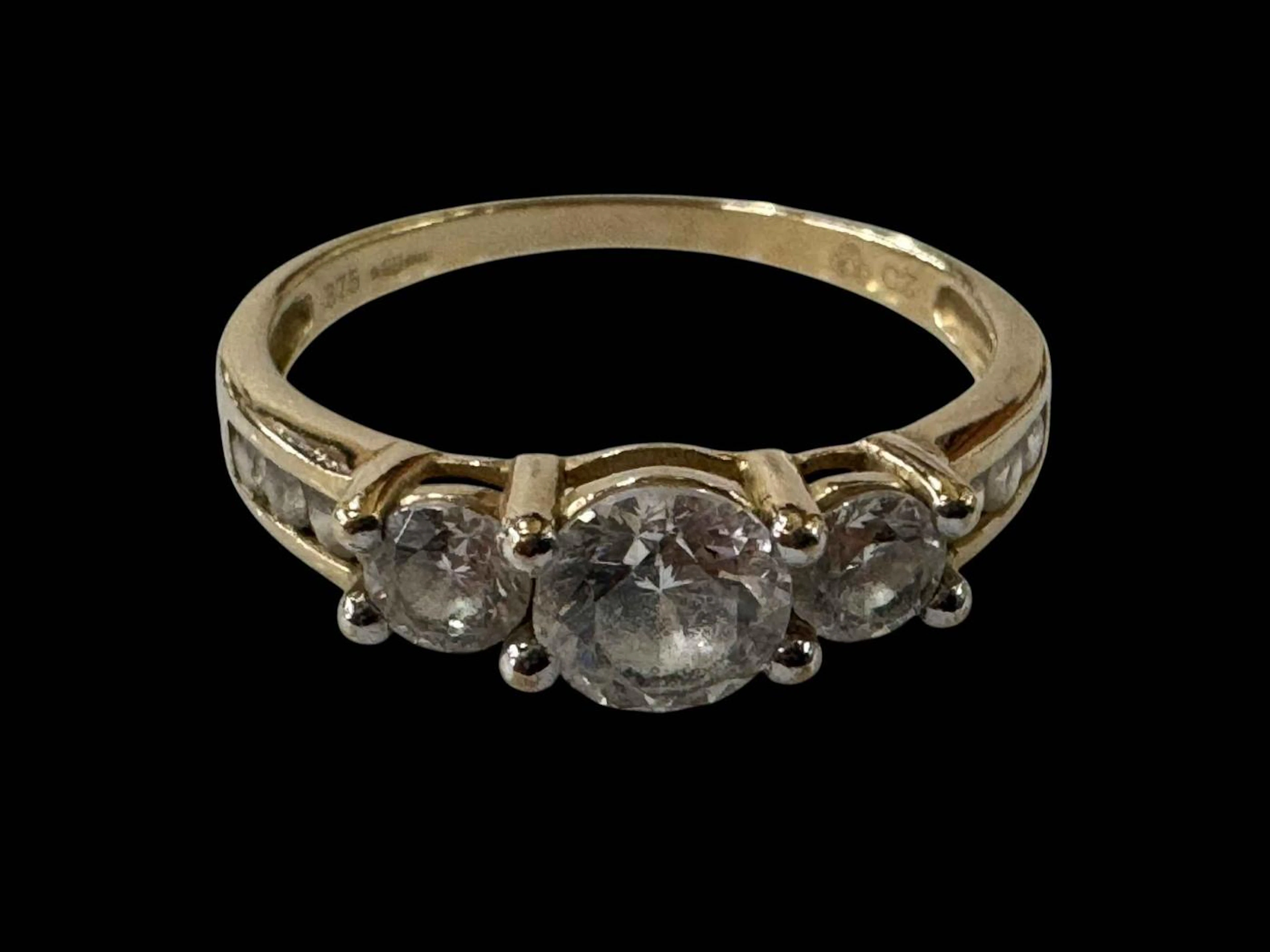 Cubic Zirconia three stone 9 carat gold ring, size U.