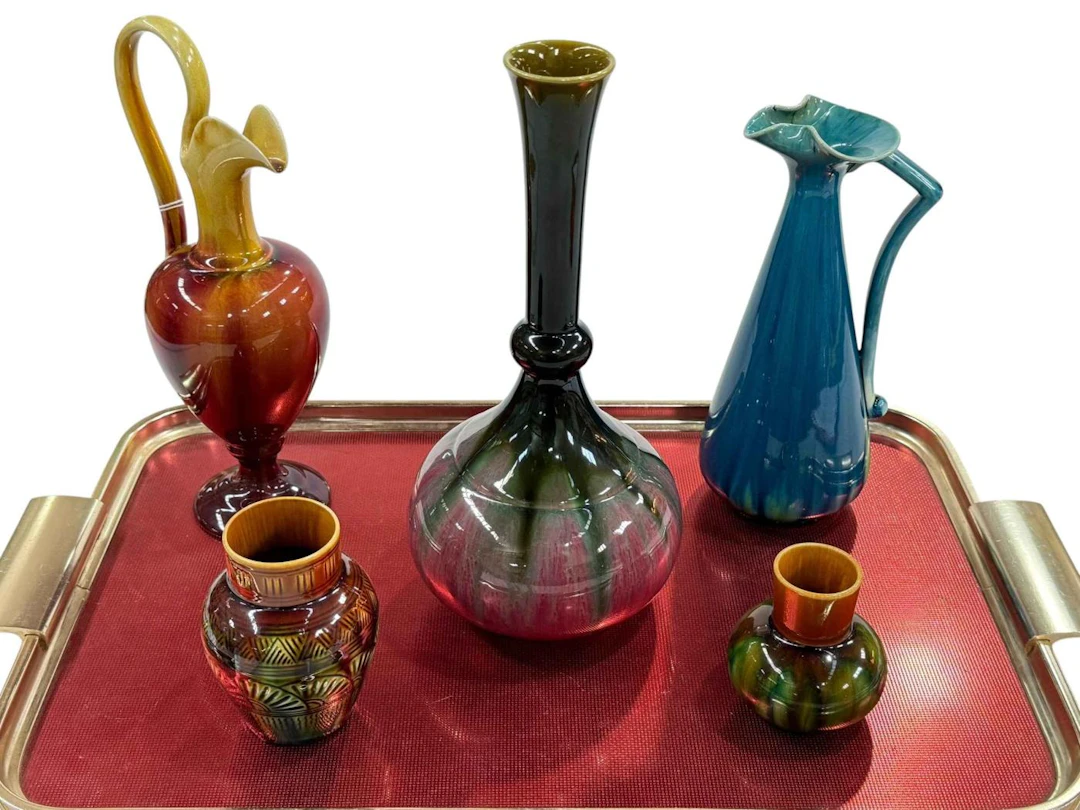 Five pieces of Linthorpe Pottery including turquoise ewer 1340.