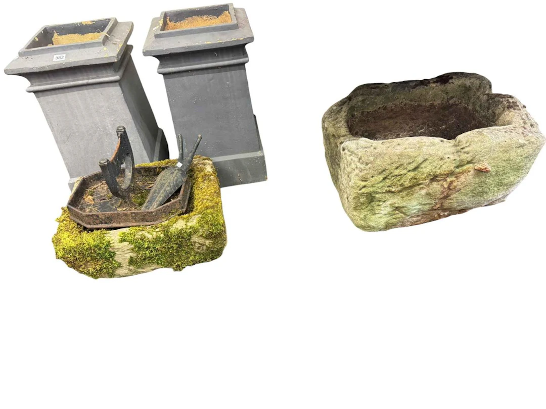 Two sandstone planters, pair of chimney planters, footscraper and a welly pull.