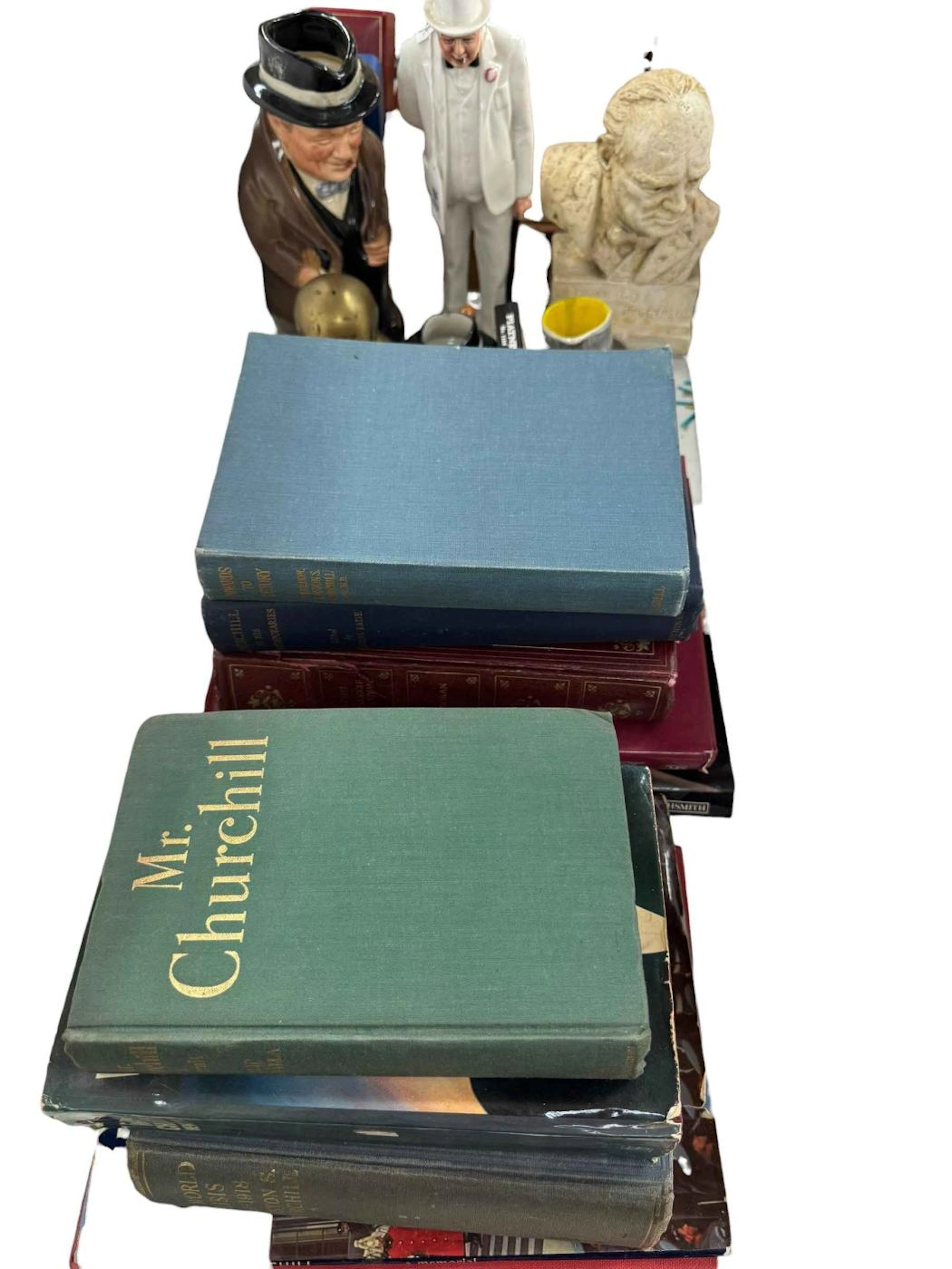 Collection of Winston Churchill related items including figures, busts