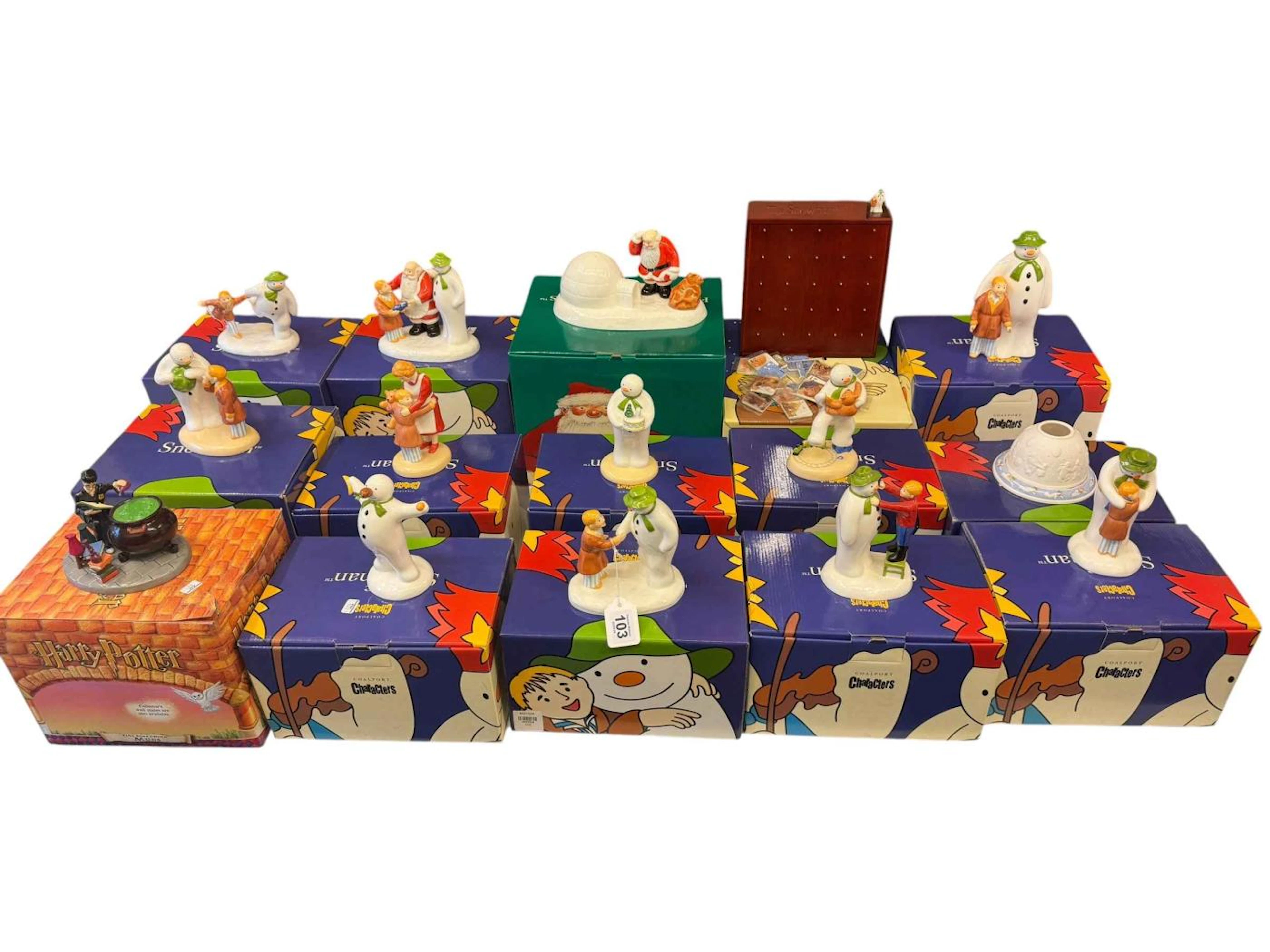 Twelve boxed Coalport 'The Snowman' figures including 'The Adventure