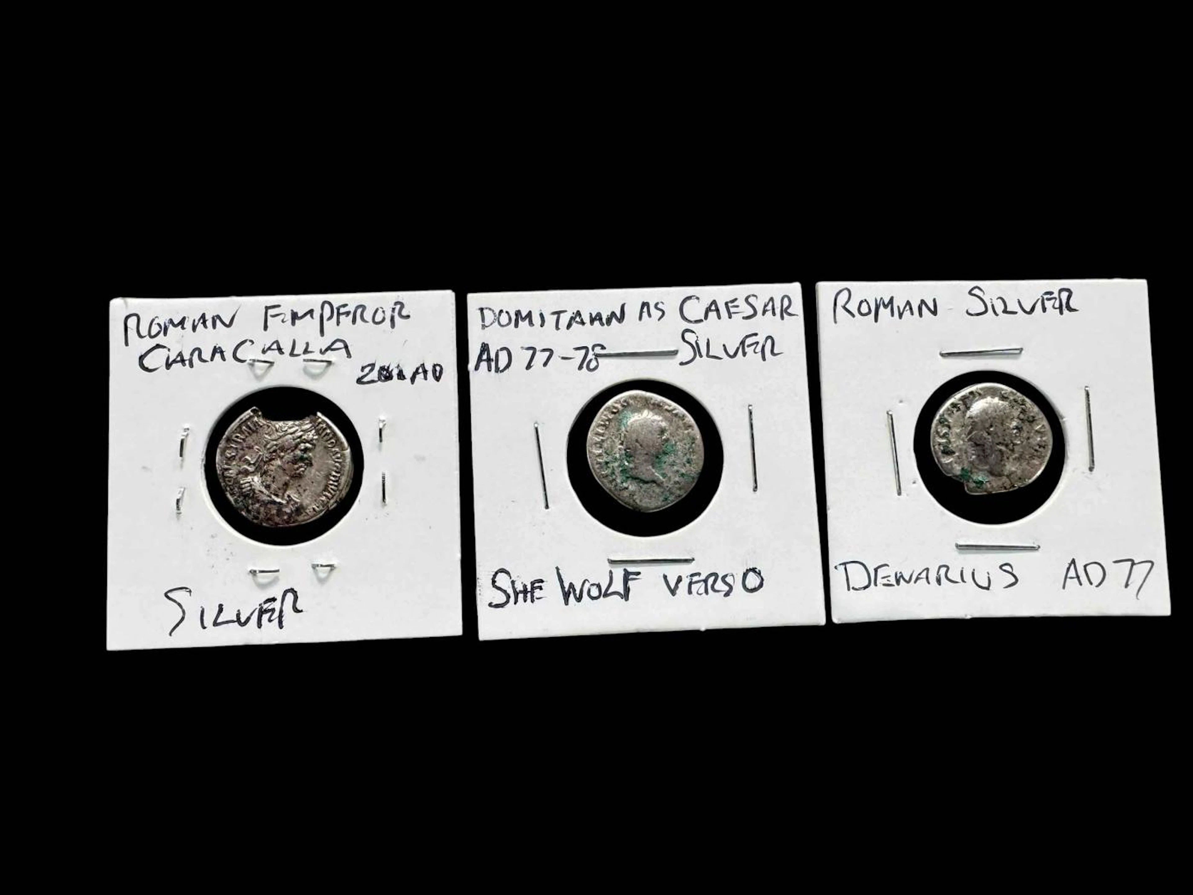 Three Roman coins.