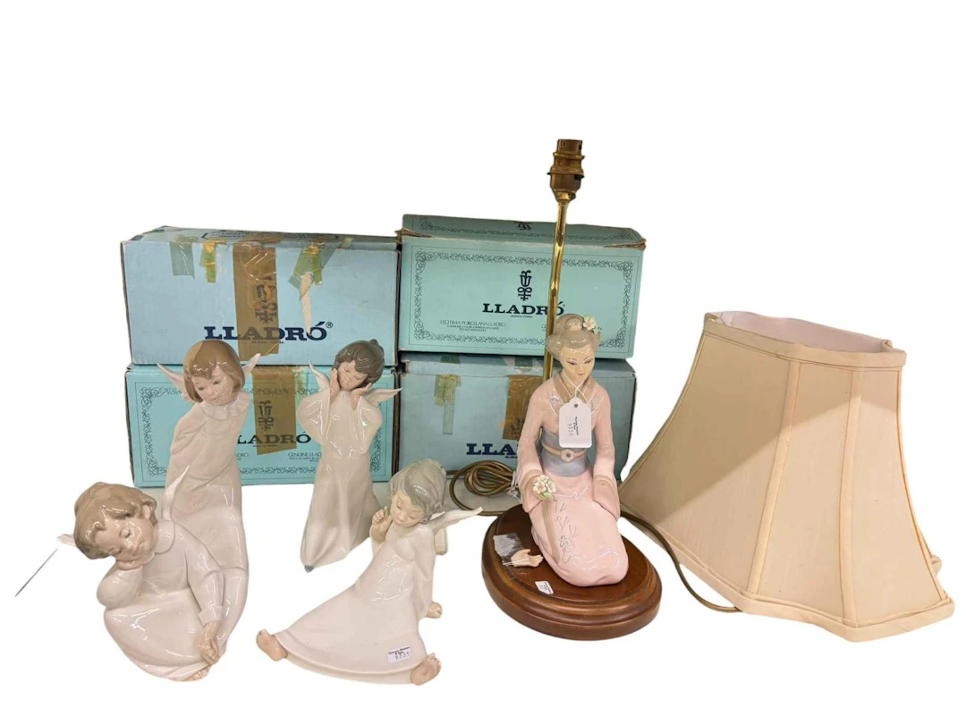 Lladro table lamp and four angel figures.