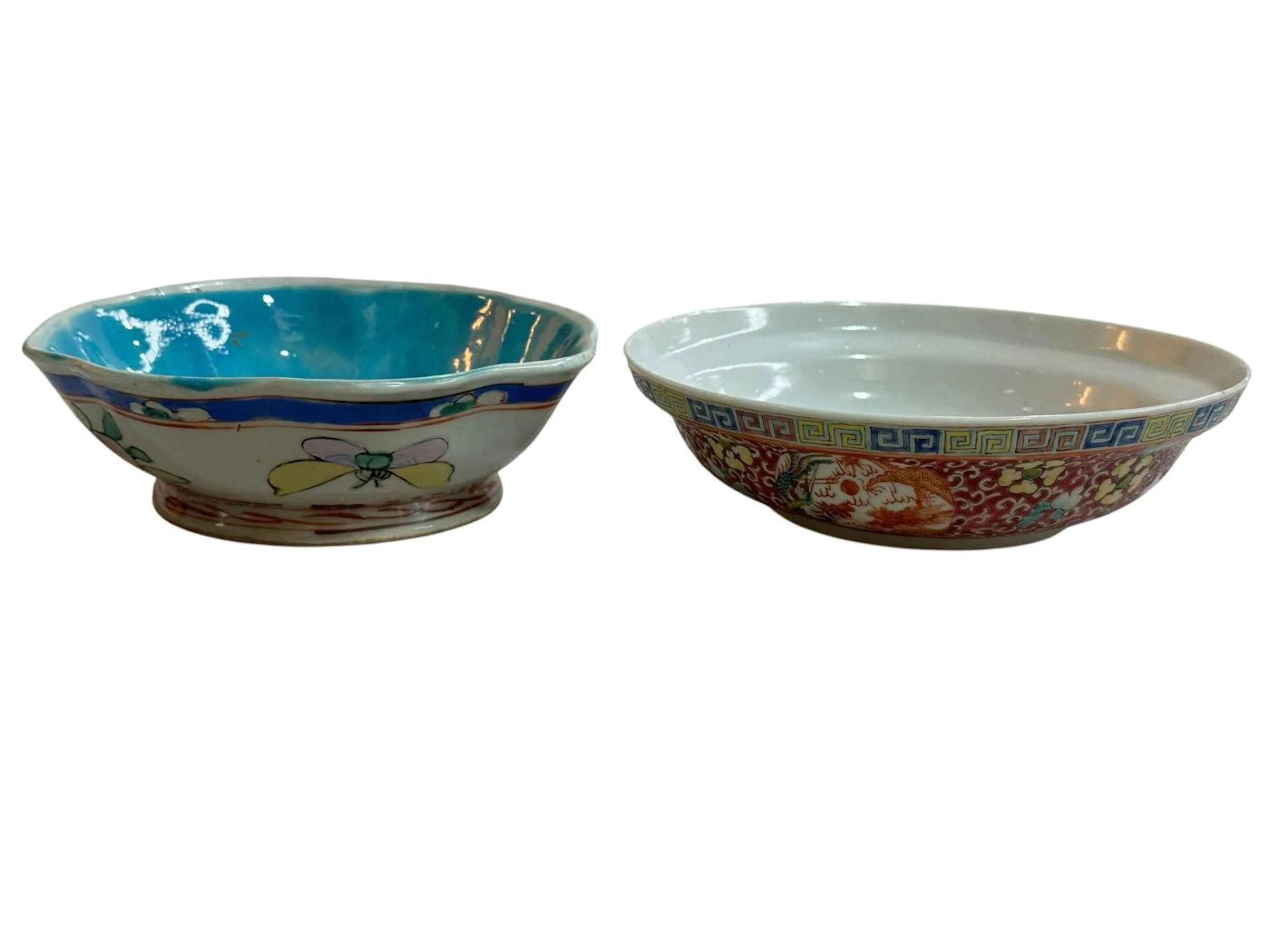Two Chinese floral decorated shallow bowls.