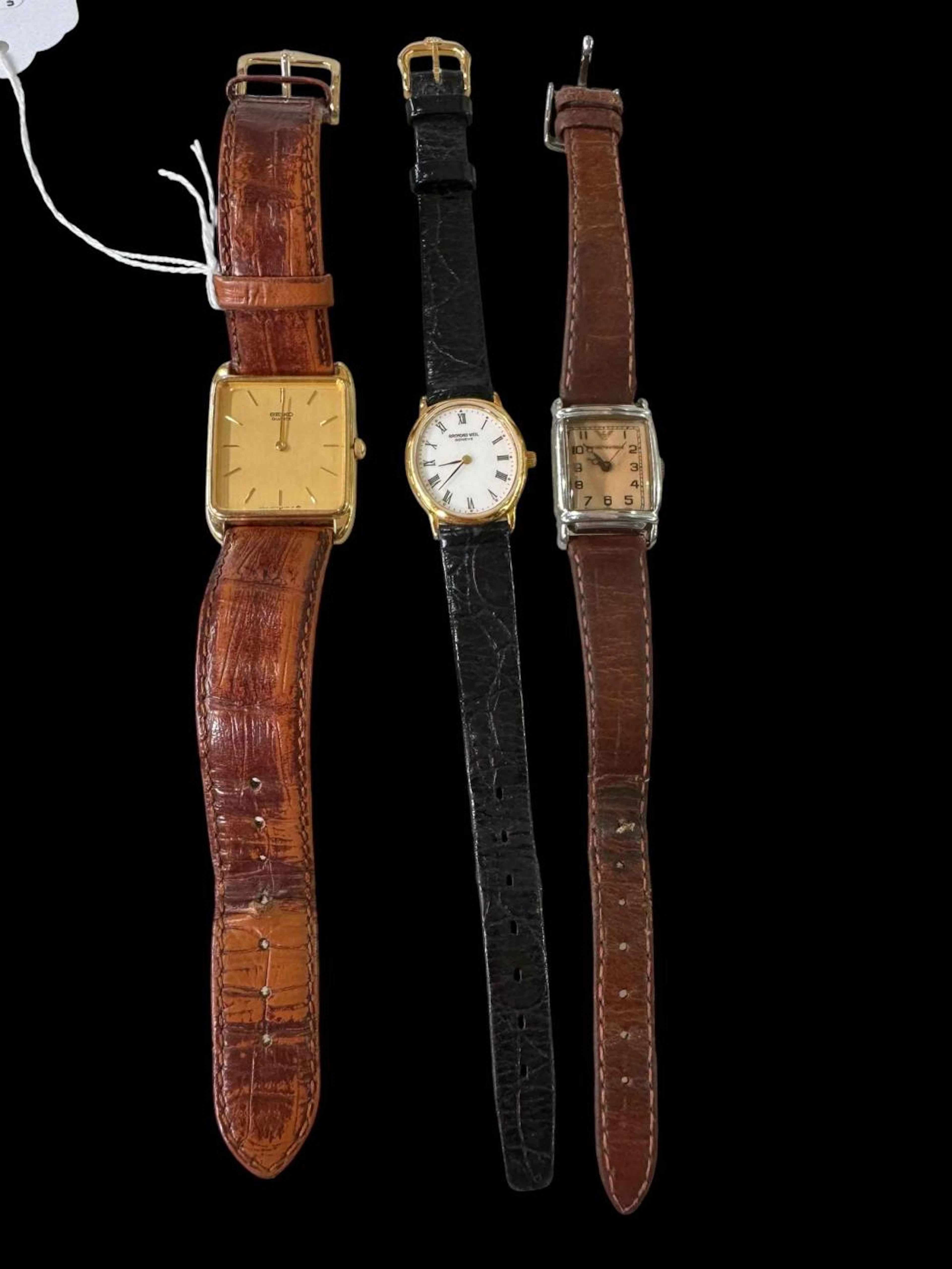 Three wristwatches, Raymond Weil, Seiko and Armani.