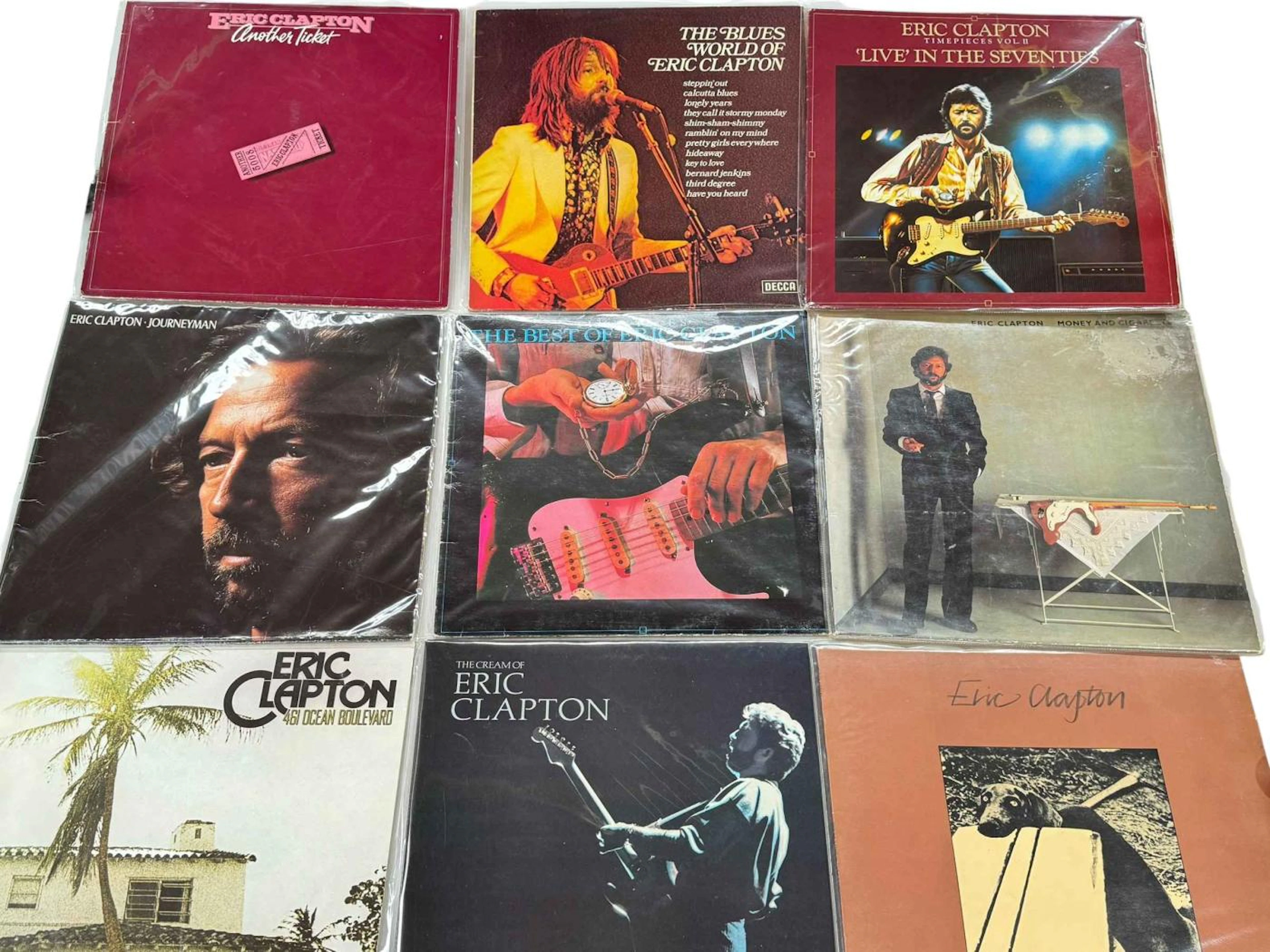 Box of LP records including Eric Clapton (9) and Rolling Stones The