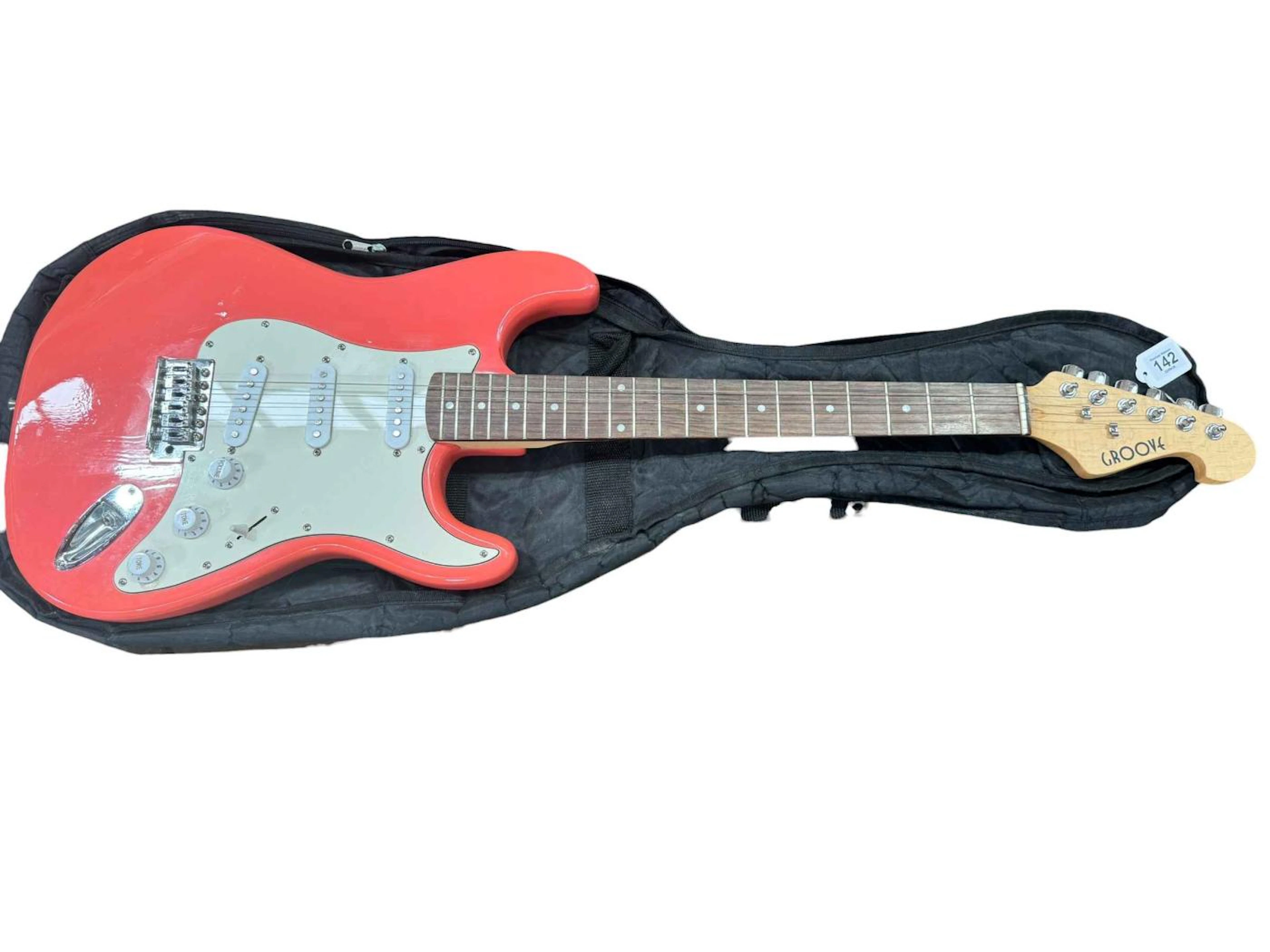 Groove electric guitar with carrier.