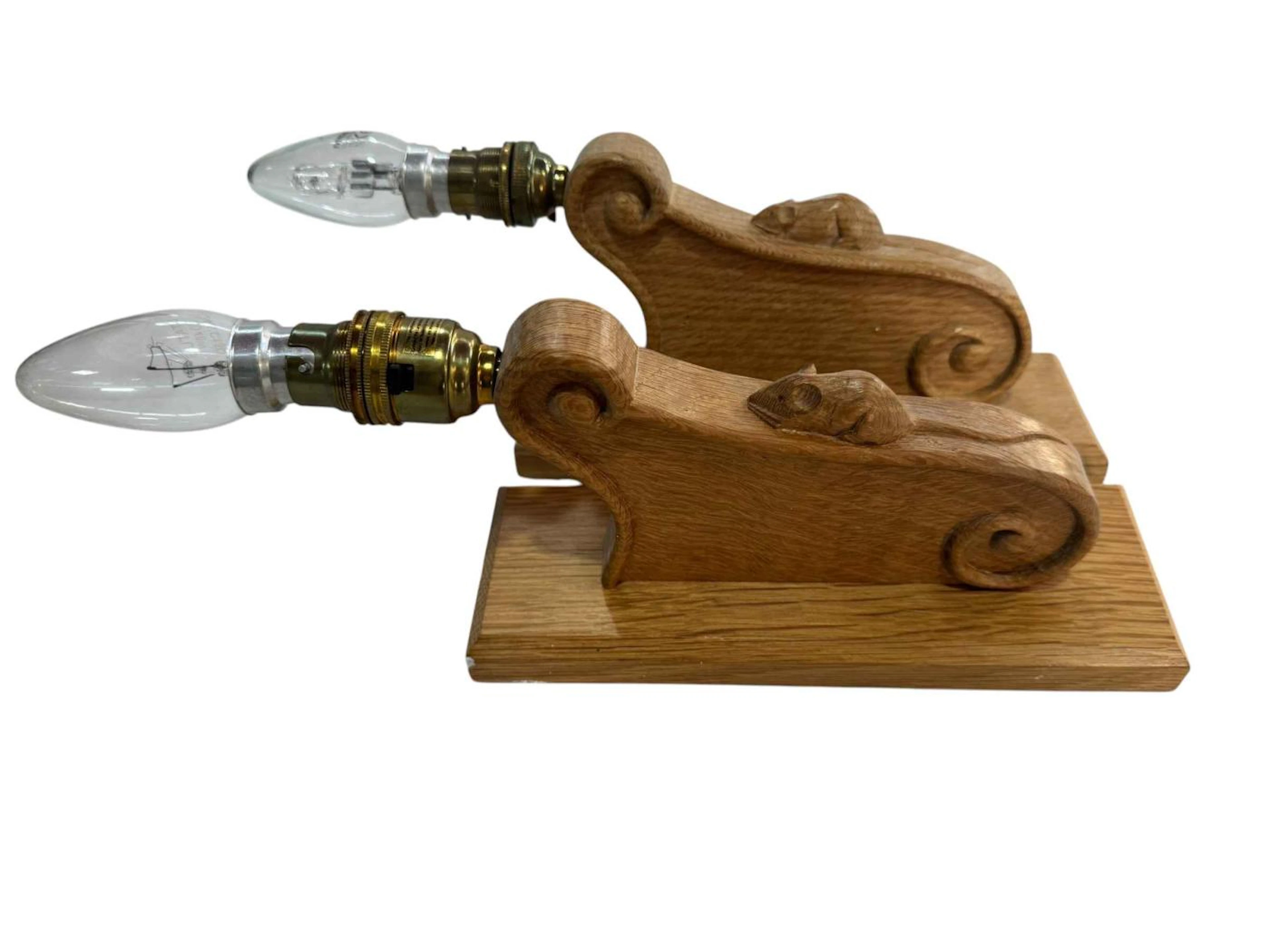 Pair of Robert Thompson of Kilburn 'Mouseman' oak wall light brackets