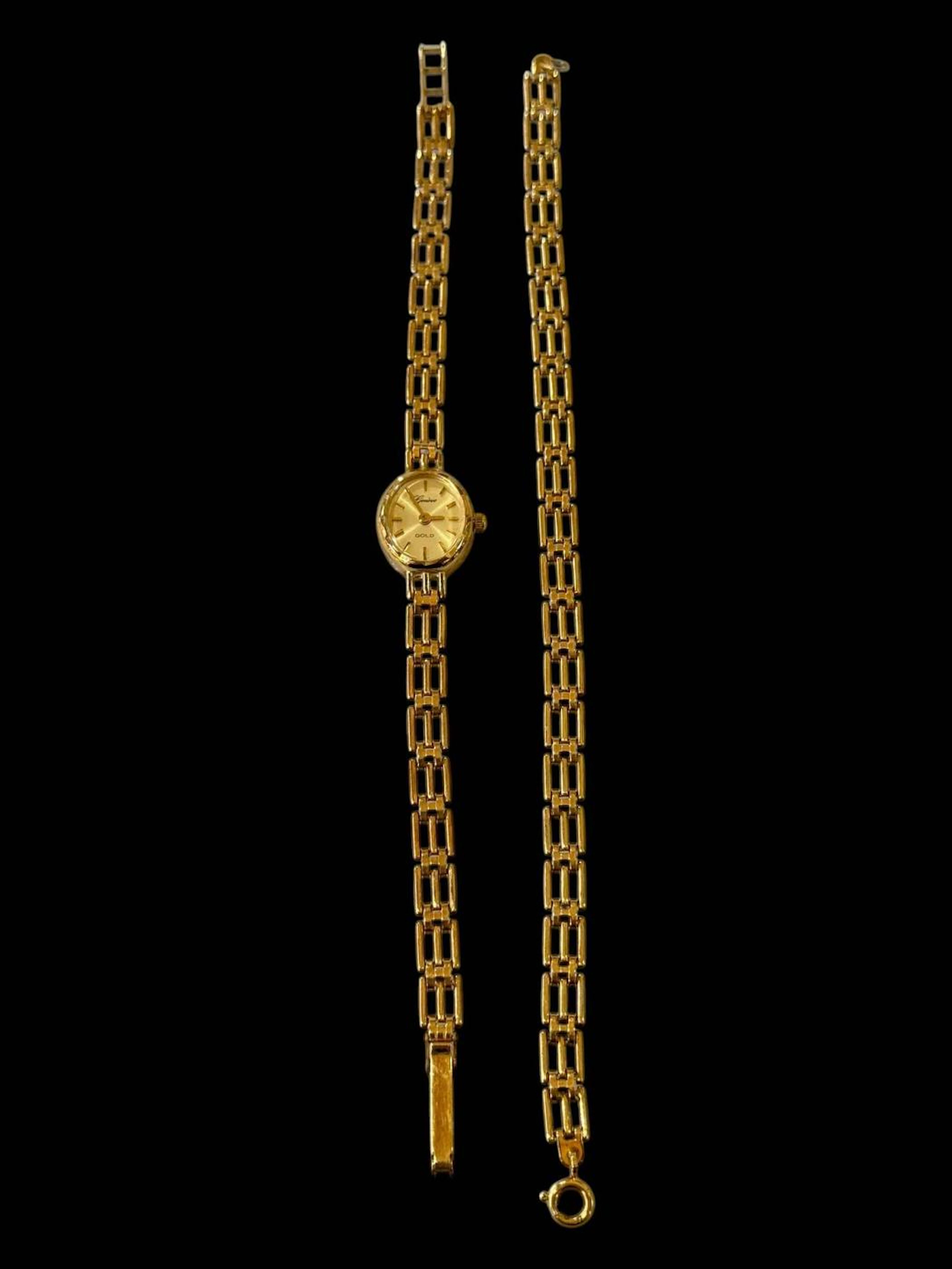 Geneve 9 carat gold bracelet watch and matching gate bracelet, boxed (2).