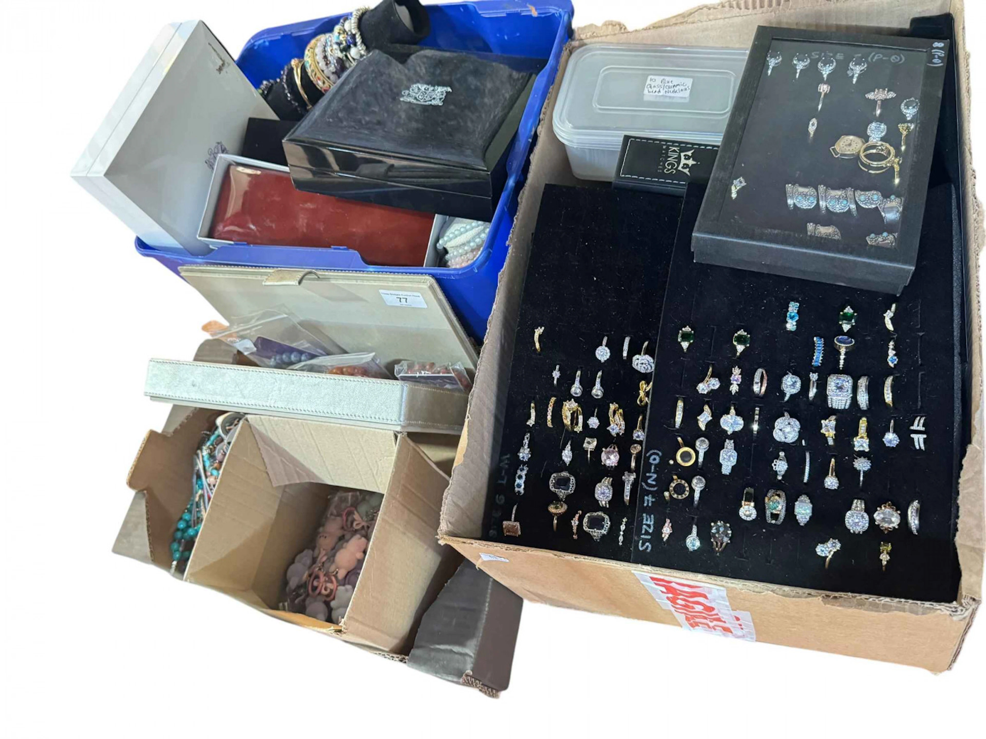 Three boxes of assorted costume jewellery including large collection
