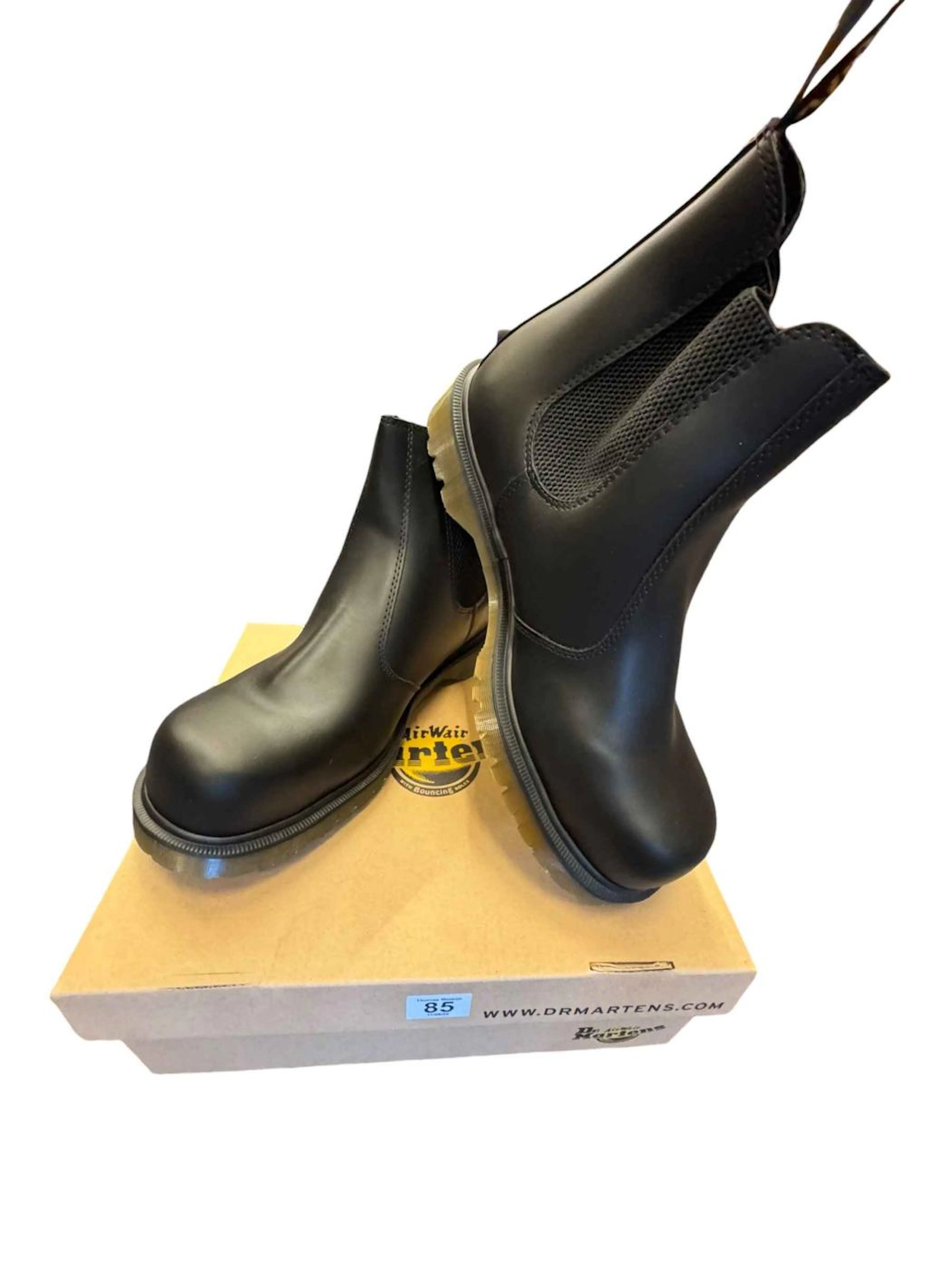 Eight pairs of steel toe capped Dr Martens safety boots, size 9's