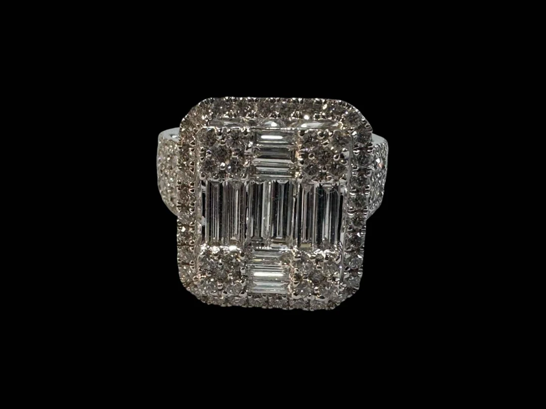 18 carat white gold diamond ring set with twelve baguettes and many