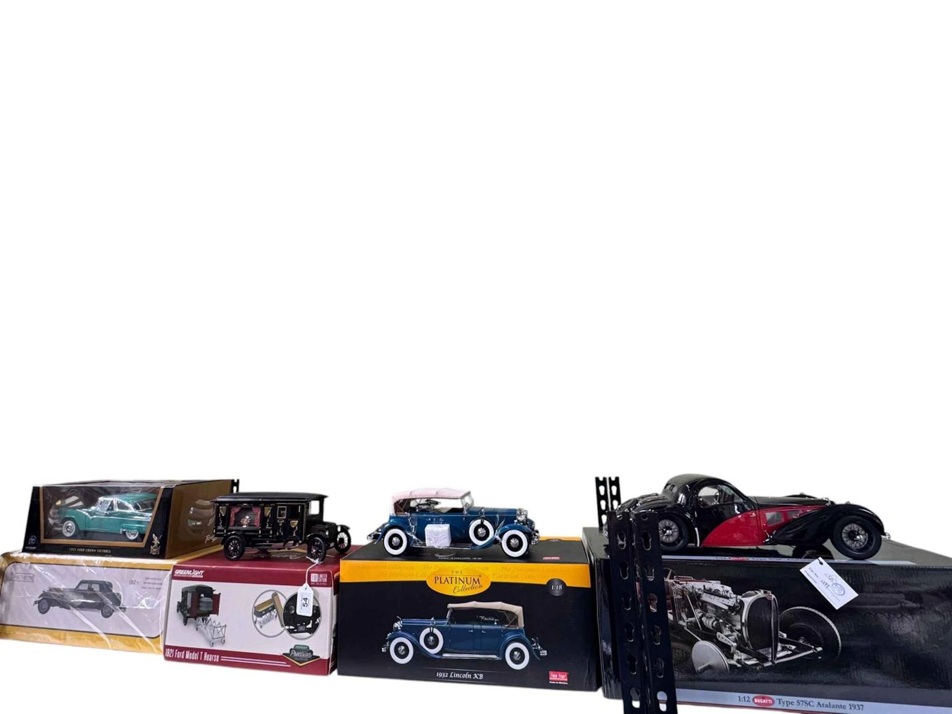 Five boxed model vehicles including 1955 Ford Crown Victoria, Panther