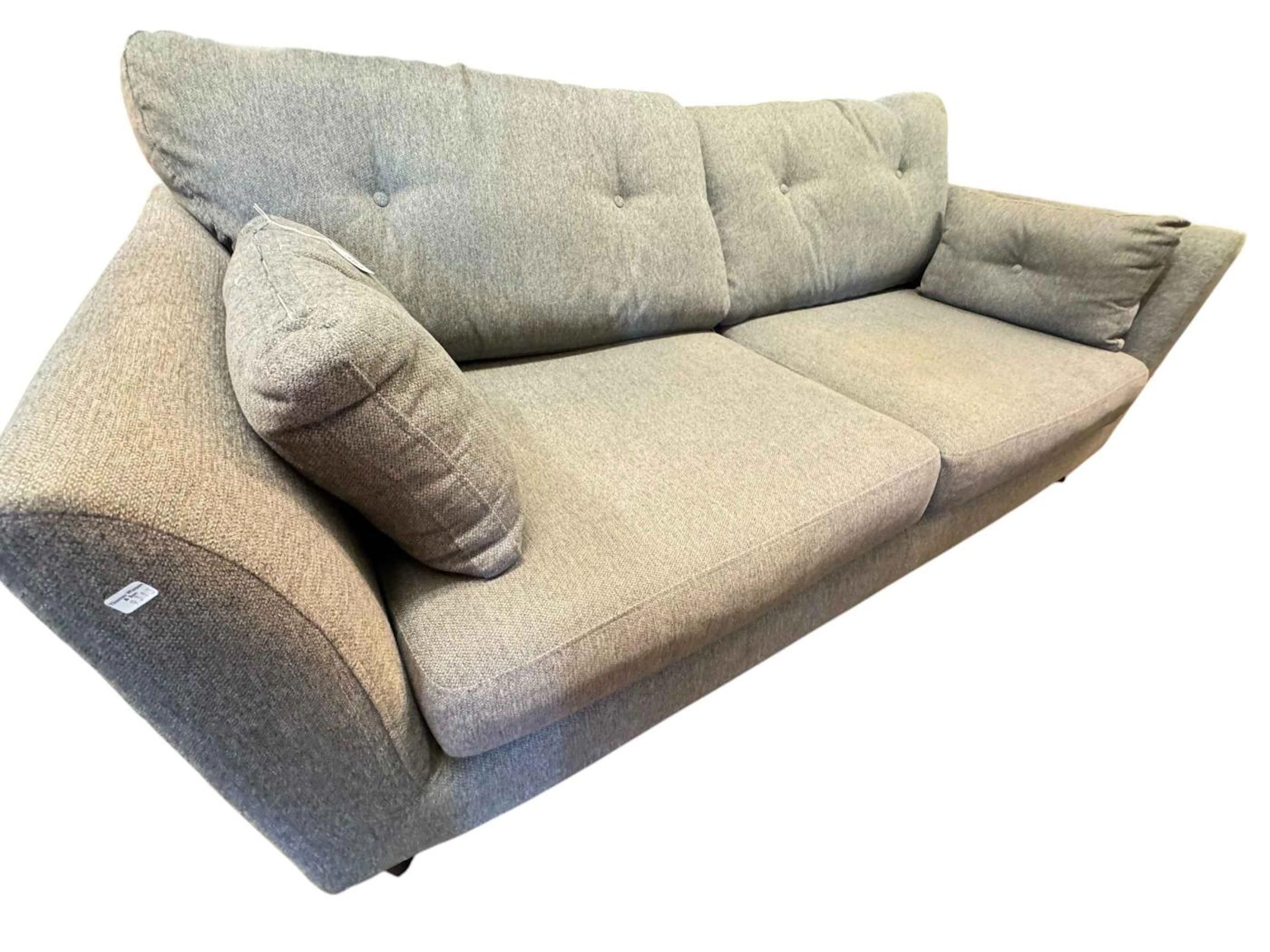 Two seater settee in grey fabric.