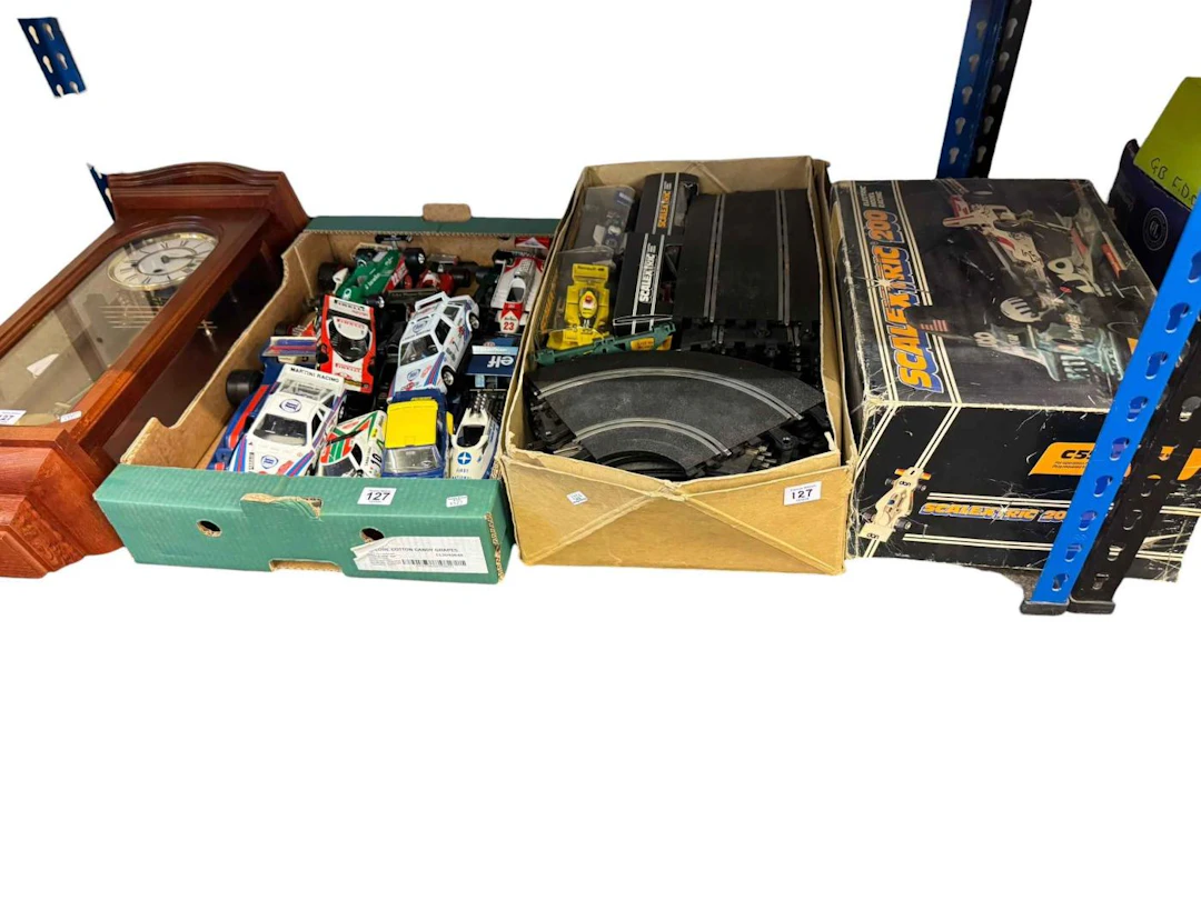 Scalextric set and accessories, model racing cars and Woodford wall clock.