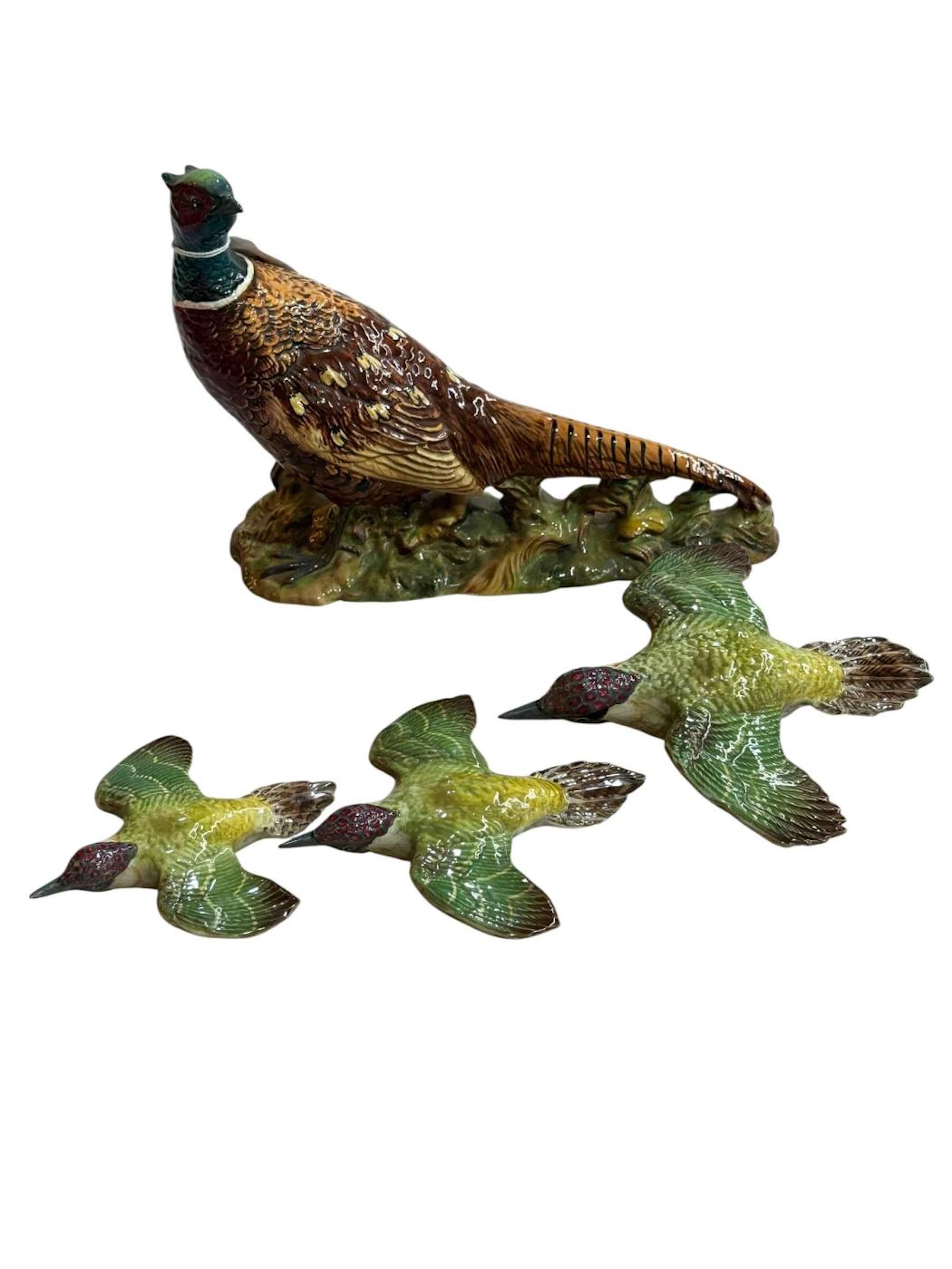 Set of three graduated Beswick Woodpecker wall plaques number 1344