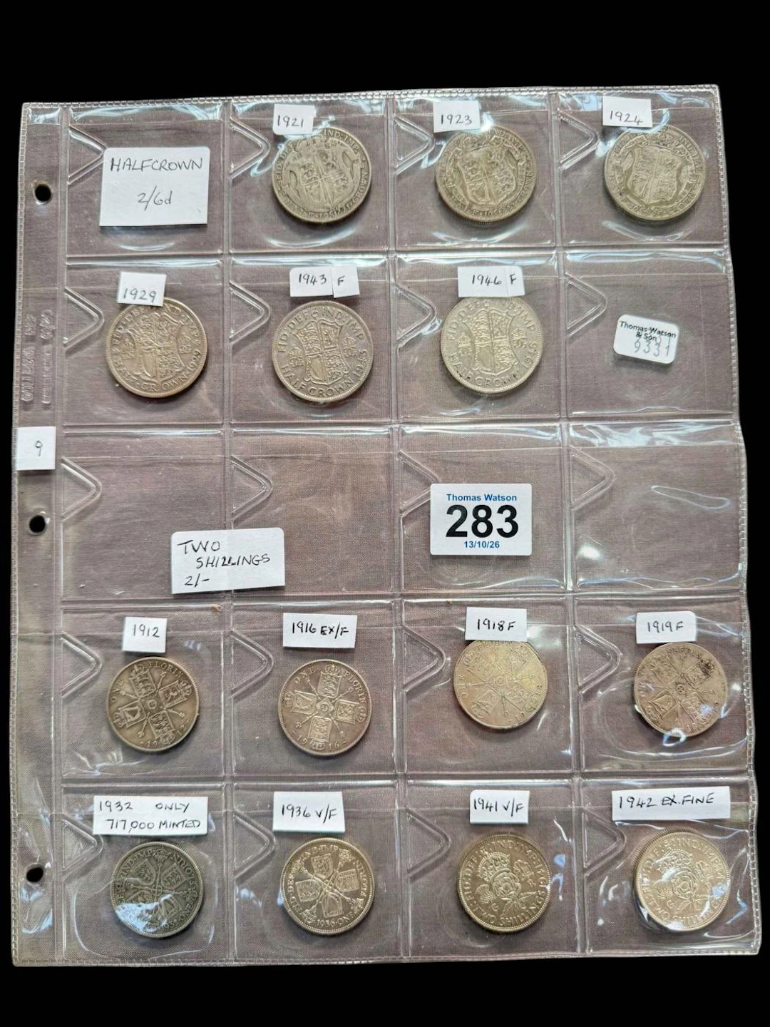 Silver coins including two shillings and half crowns.