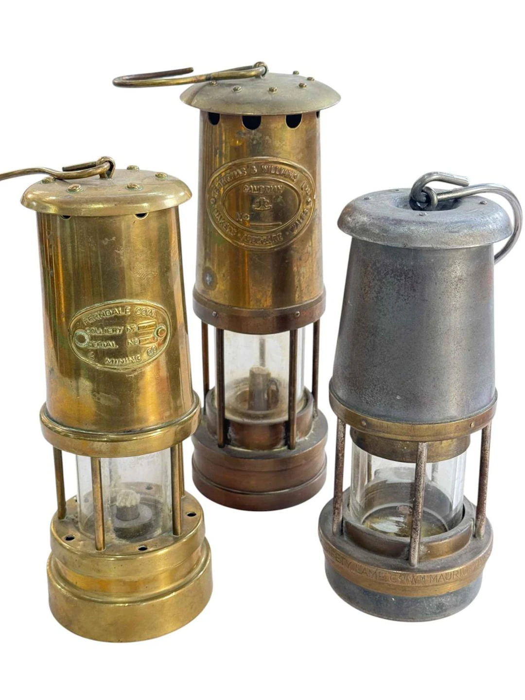 Three miners lamps.