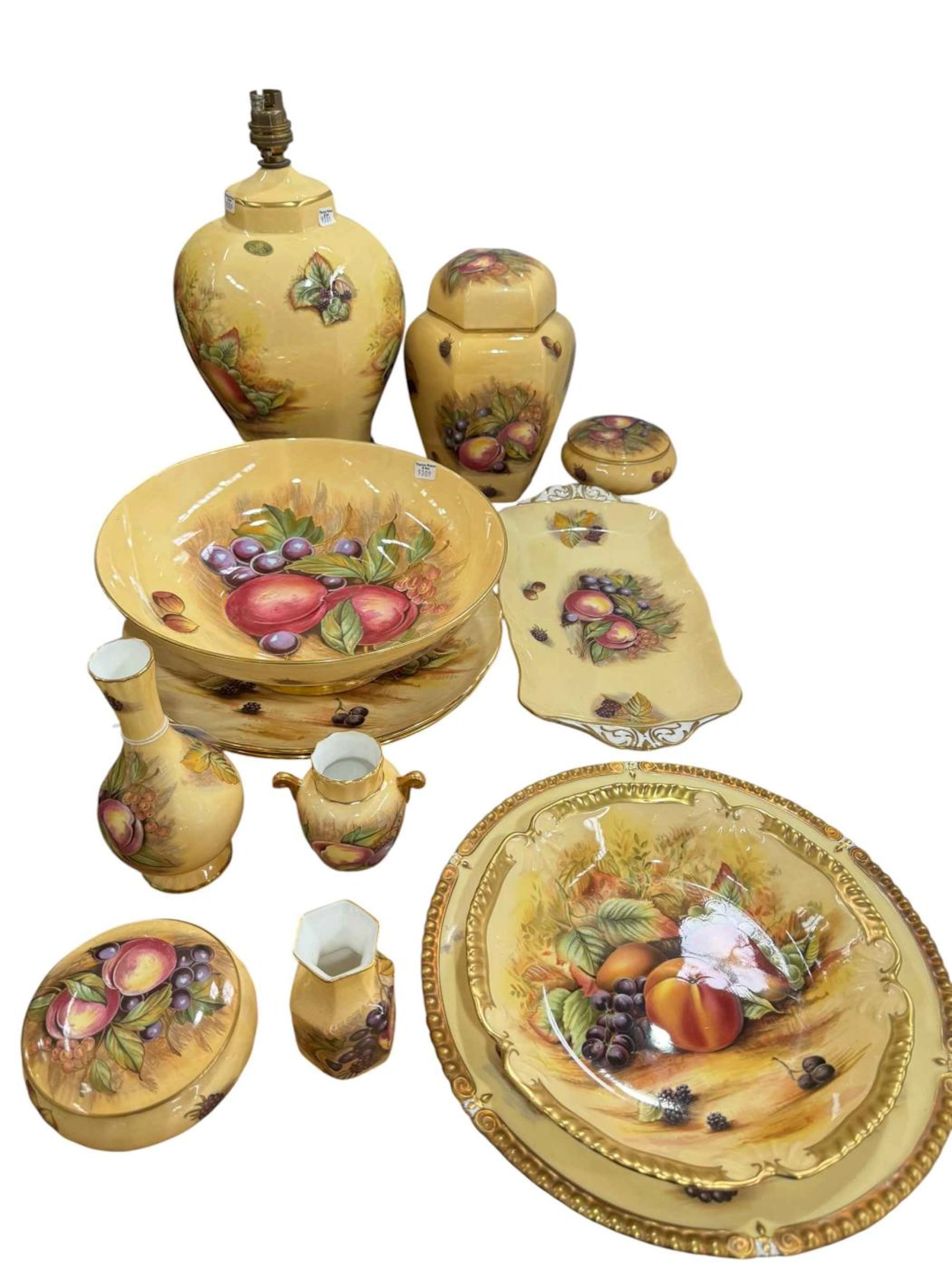 Collection of Aynsley Orchard Gold including lamp, lidded vase, bowl