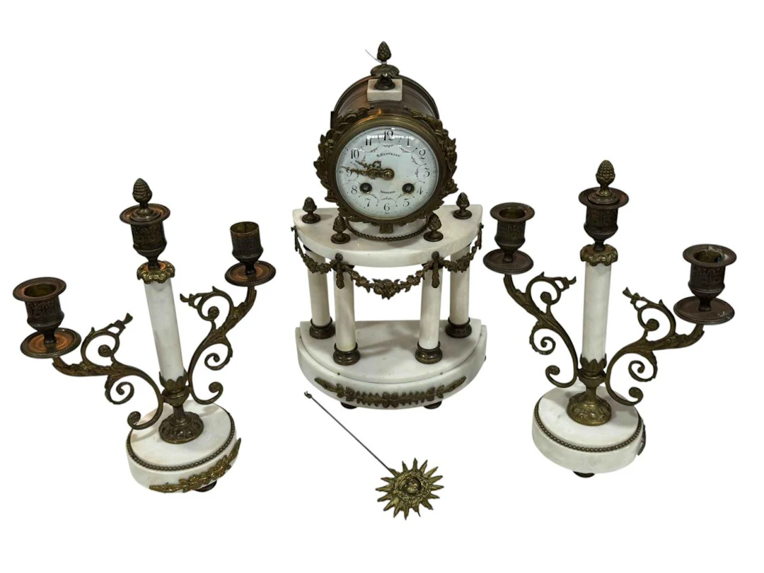 Three piece gilt metal and marble clock garniture with floral decorated