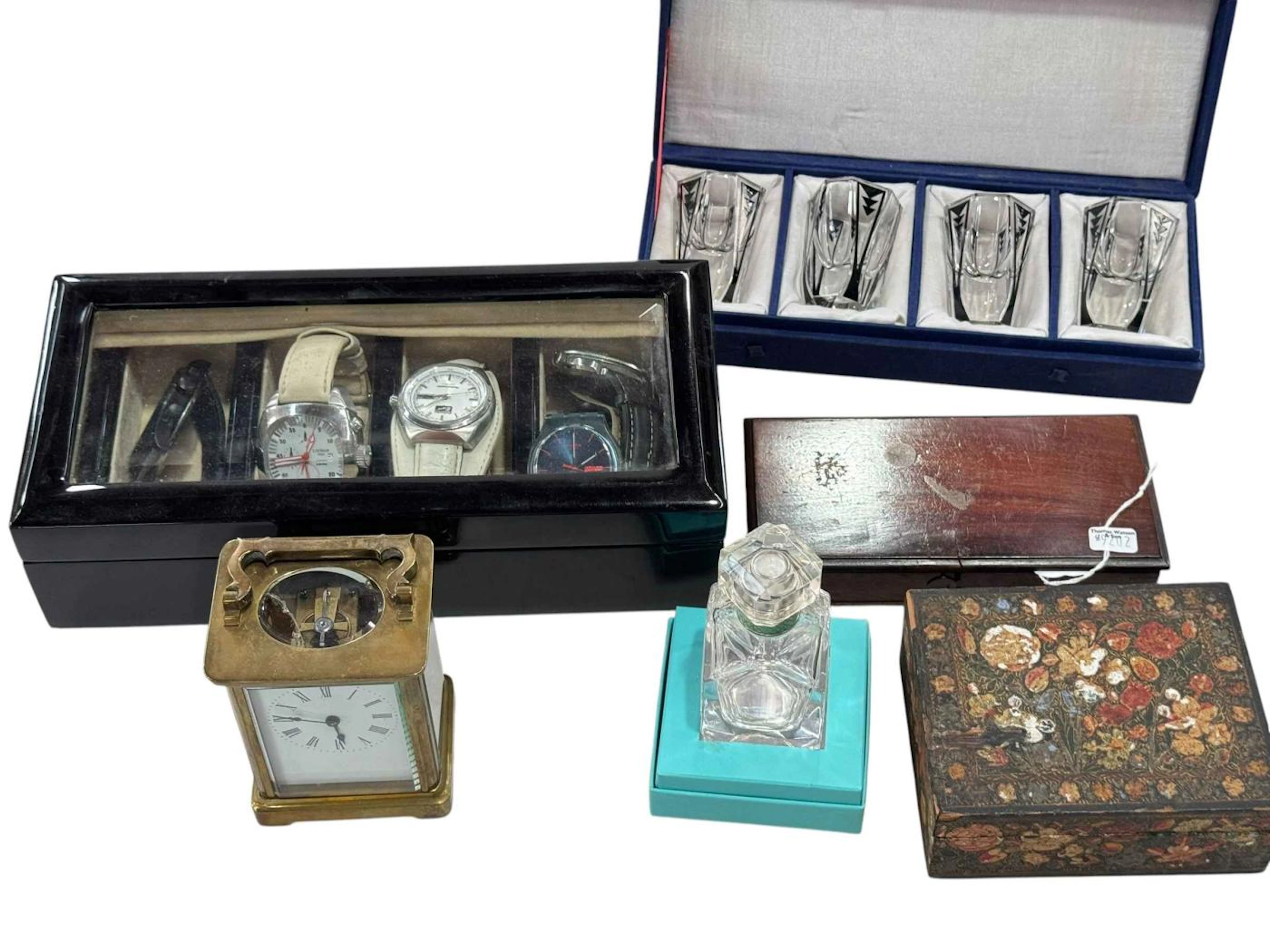 Carriage clock, four Art Deco shot glasses, watch display and watches