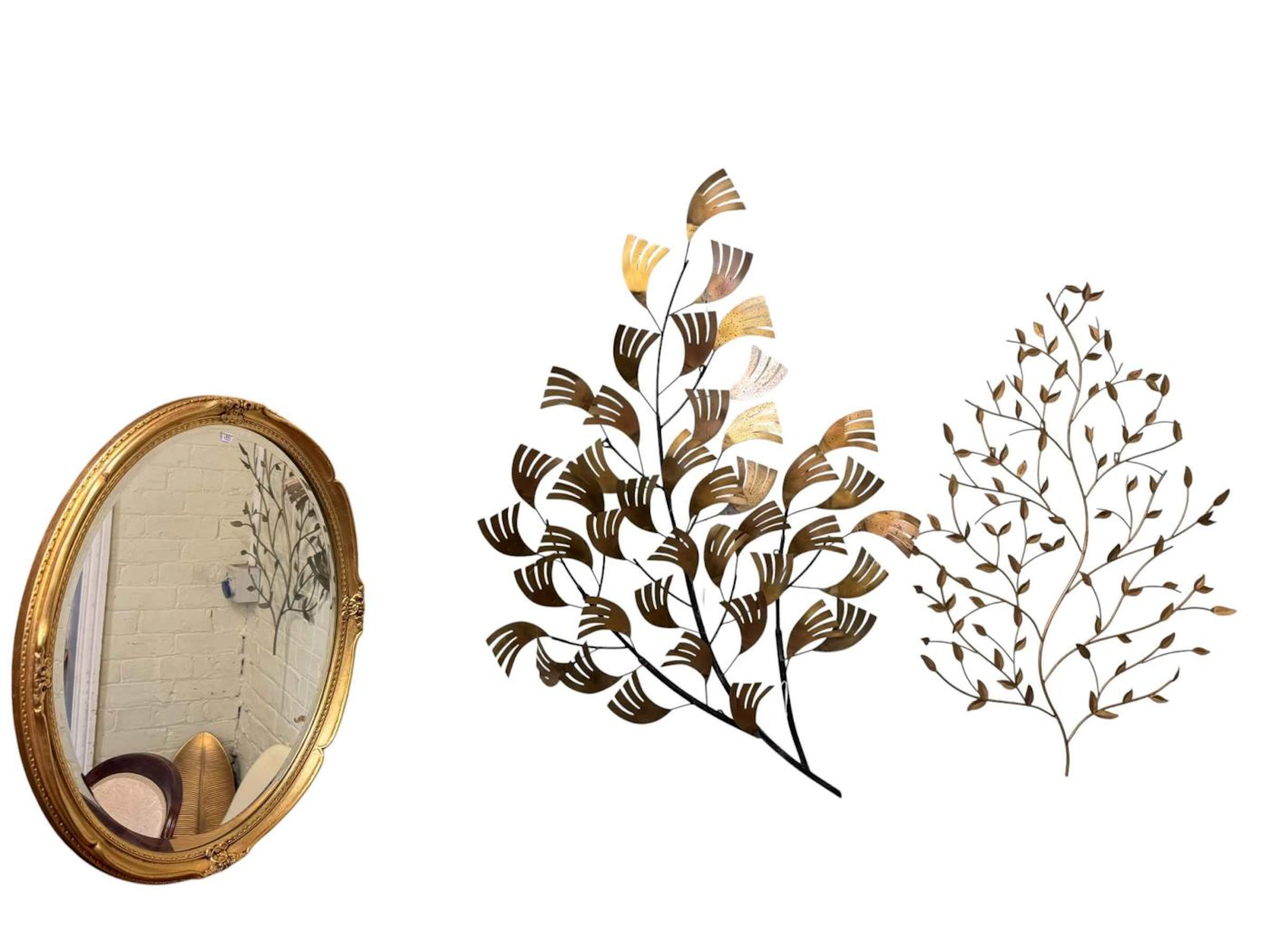 Two leaf and branch wall hangings, gilt mirror, two modern vases and