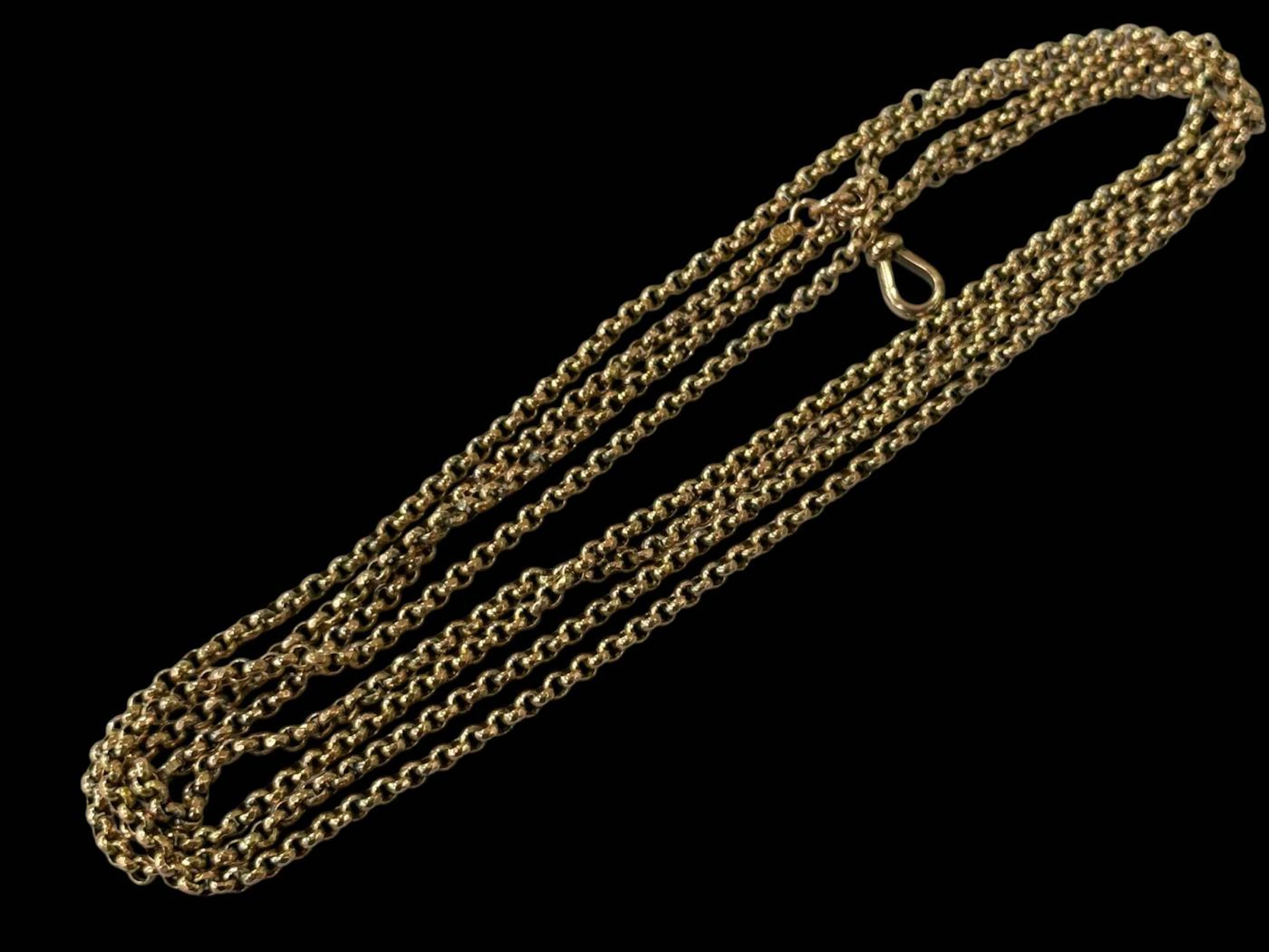 9 carat gold muff chain, 146cm length.