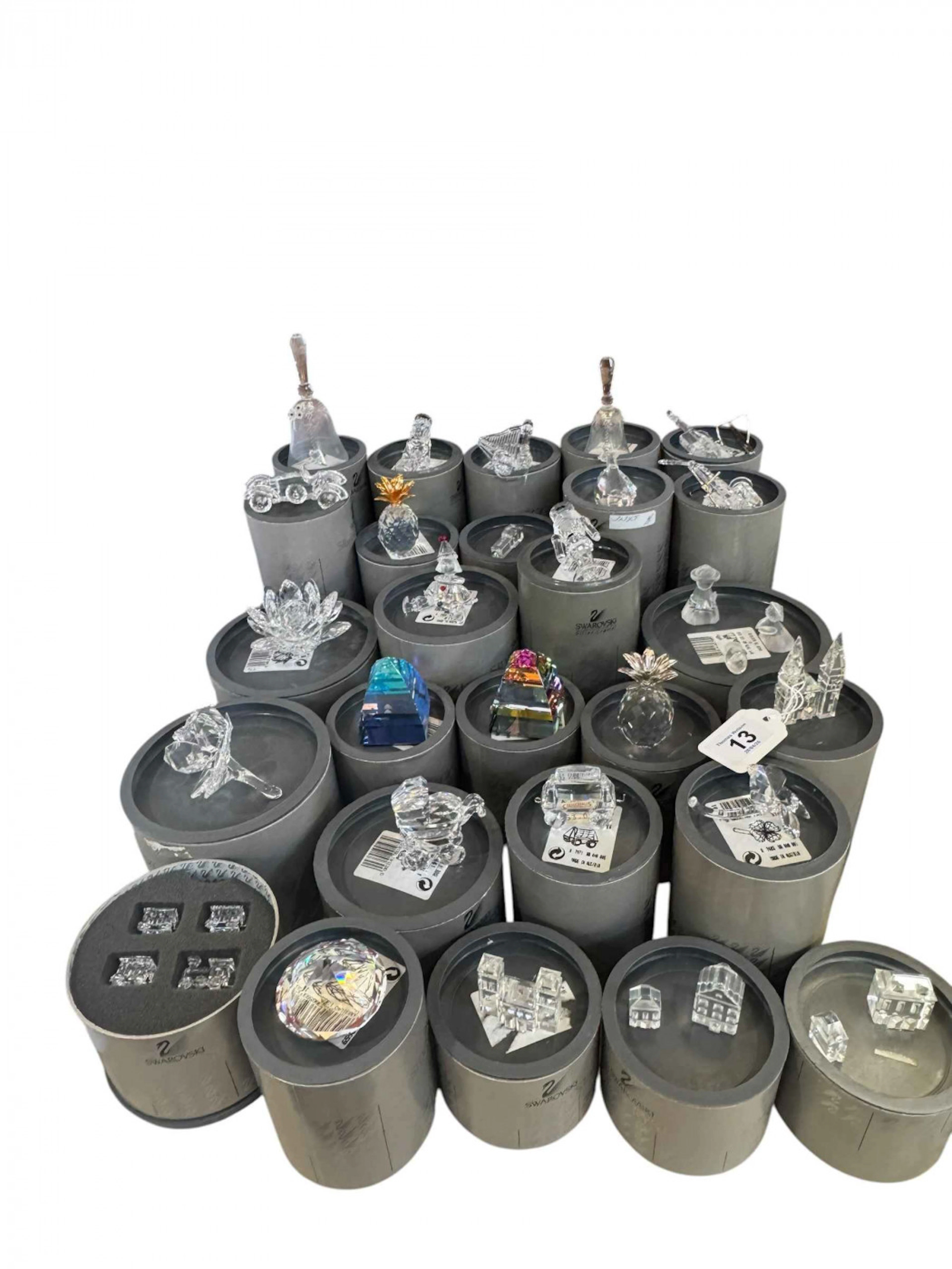 Swarovski; Twenty Seven small and medium pieces with boxes.
