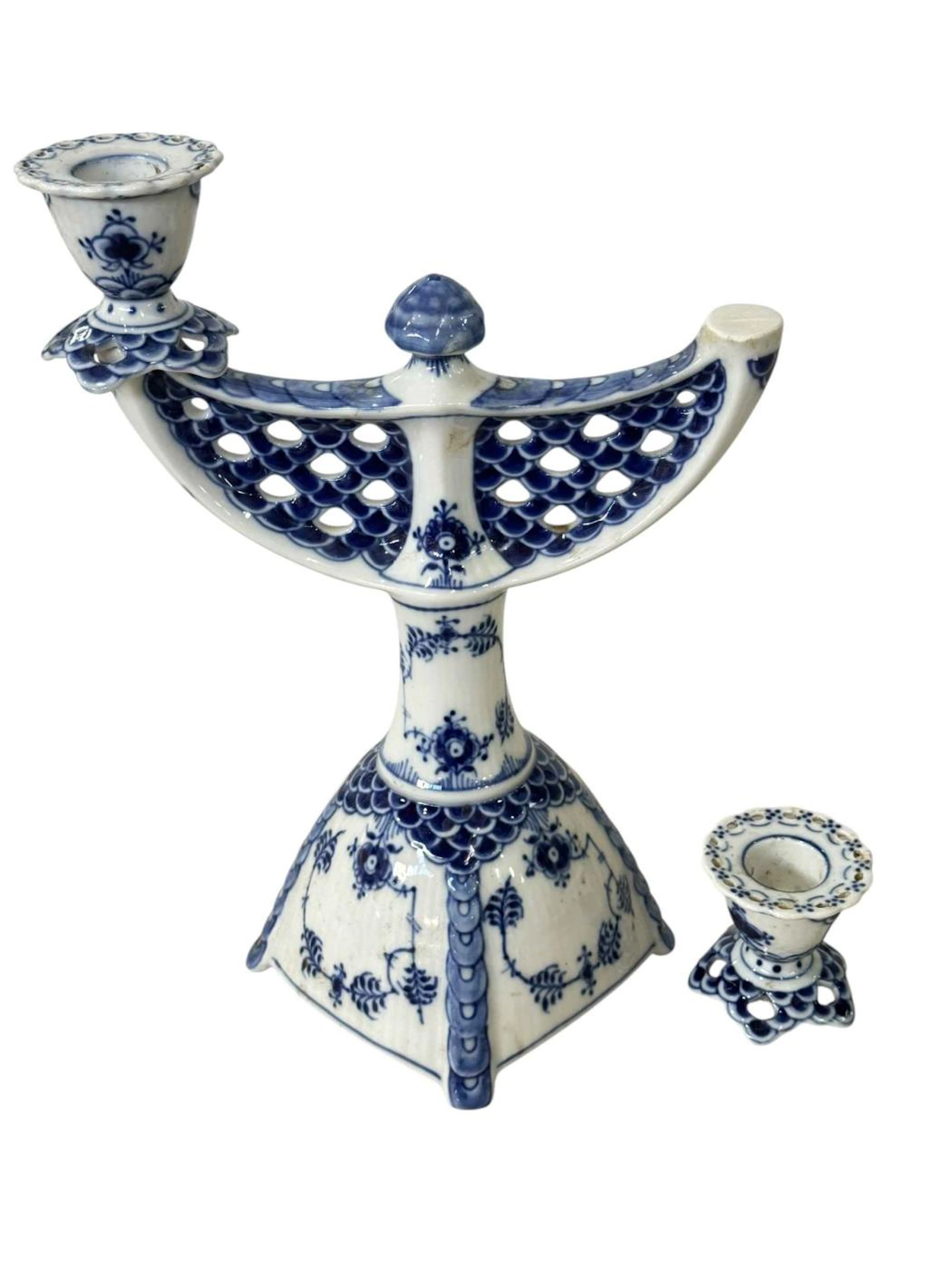 Royal Copenhagen blue fluted full lace candelabra, one scene detached