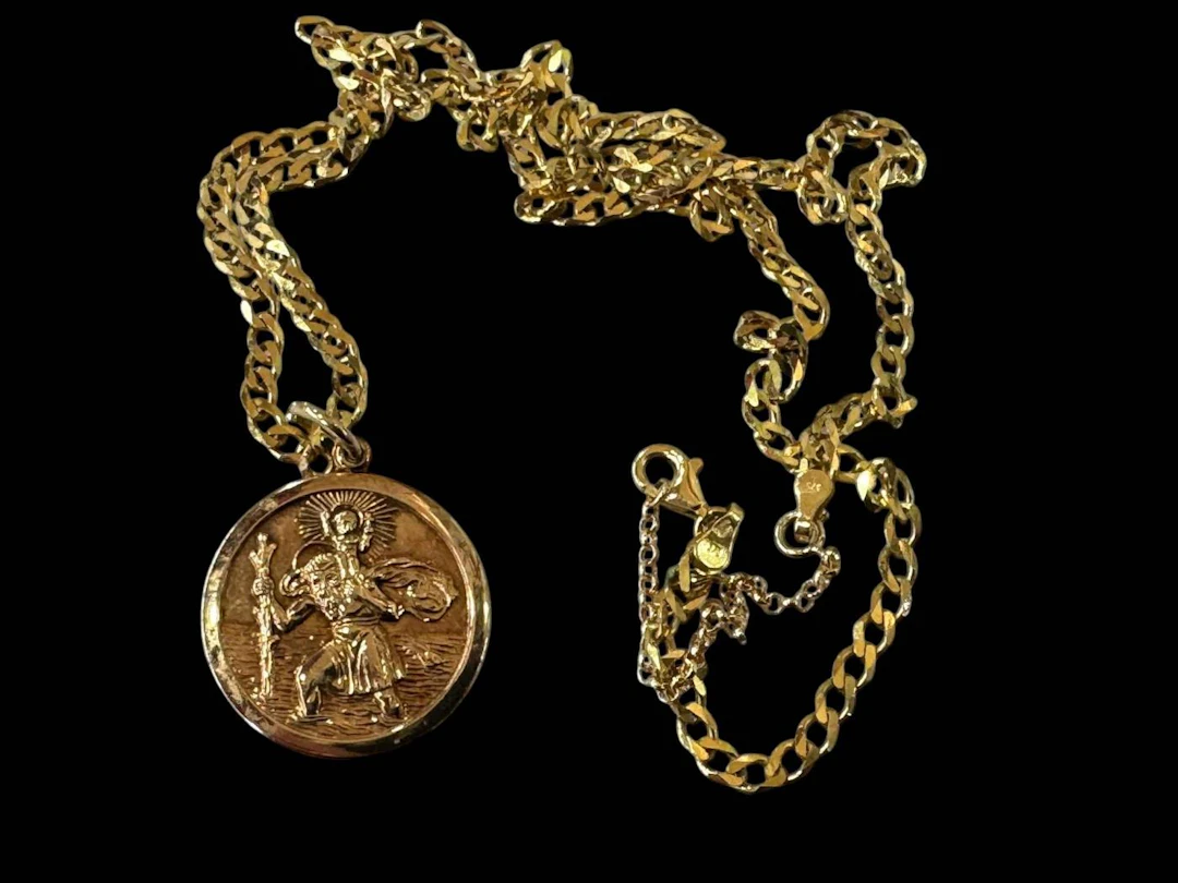 9 carat gold St Christopher pendant with flat link chain.