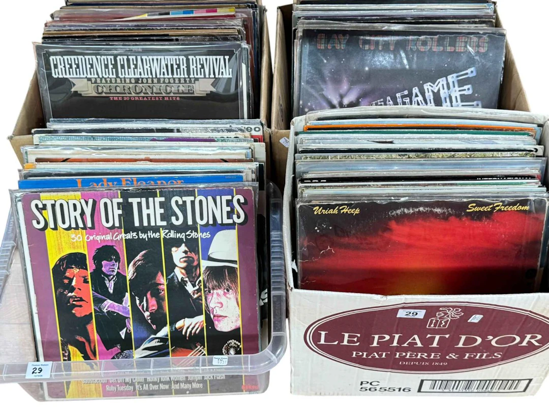 Four boxes of LP records.