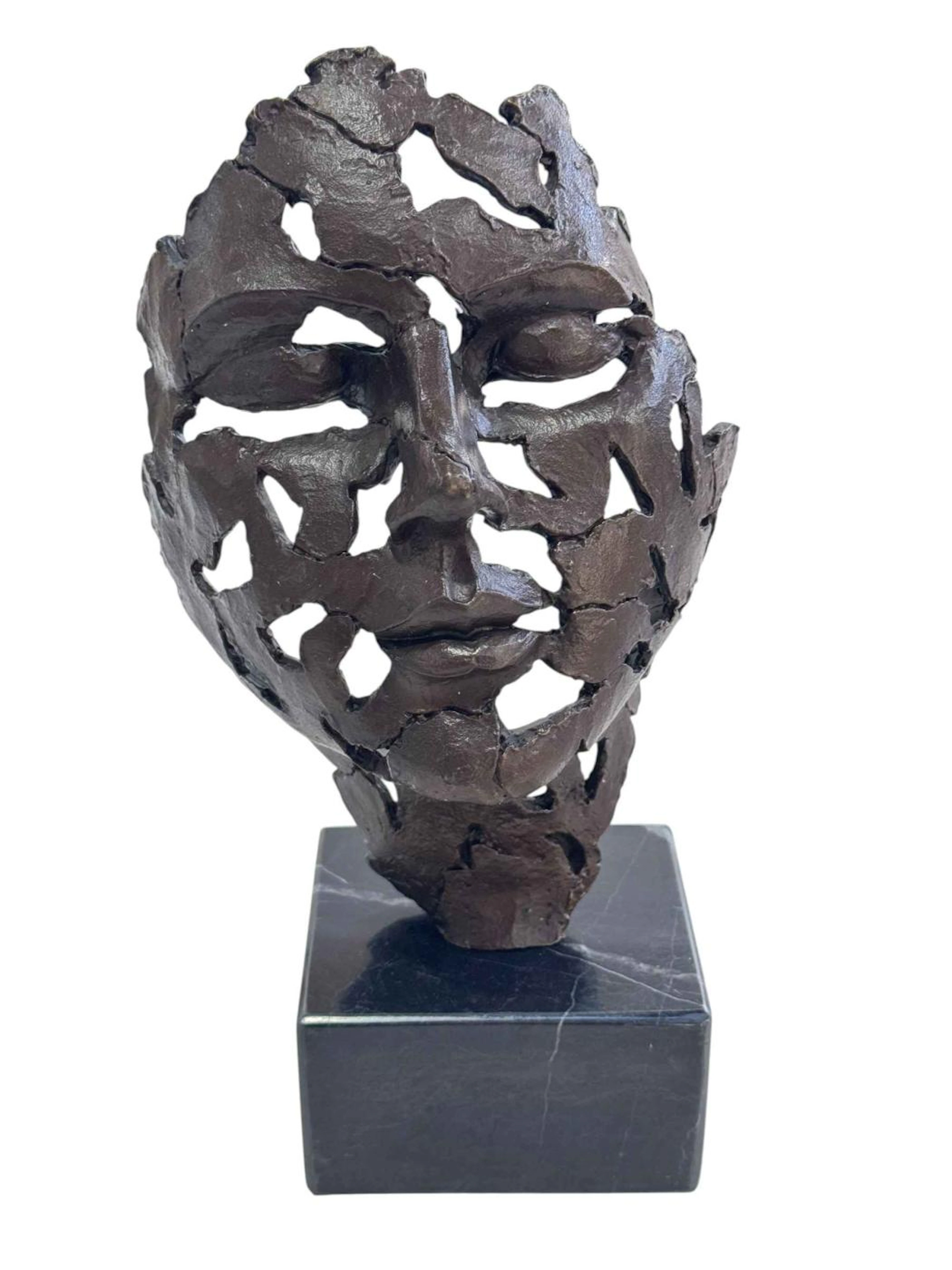 Bronze mask sculpture, 27cm.
