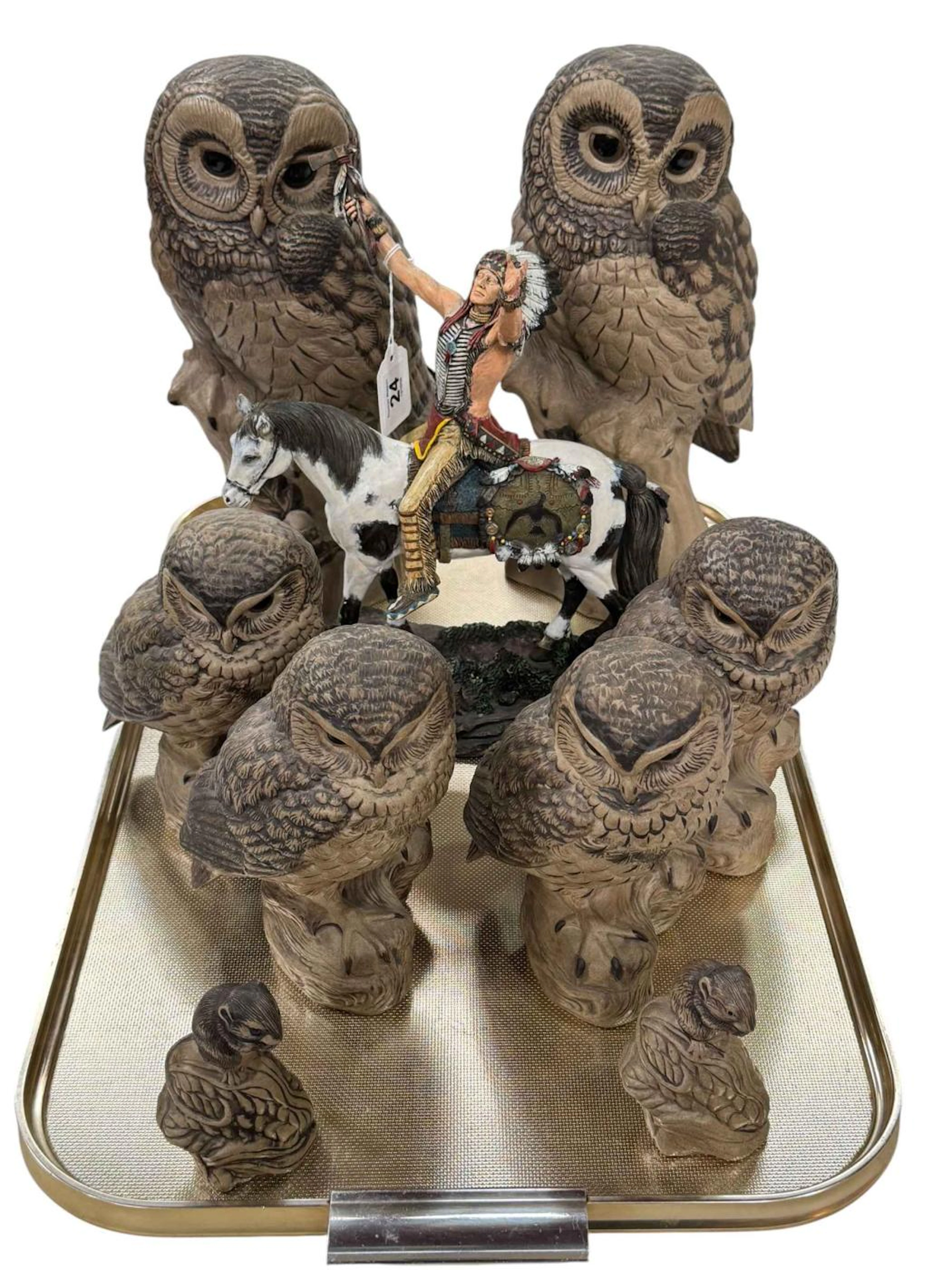 Collection of six Poole owls and two mice, and resin sculpture of Indian.