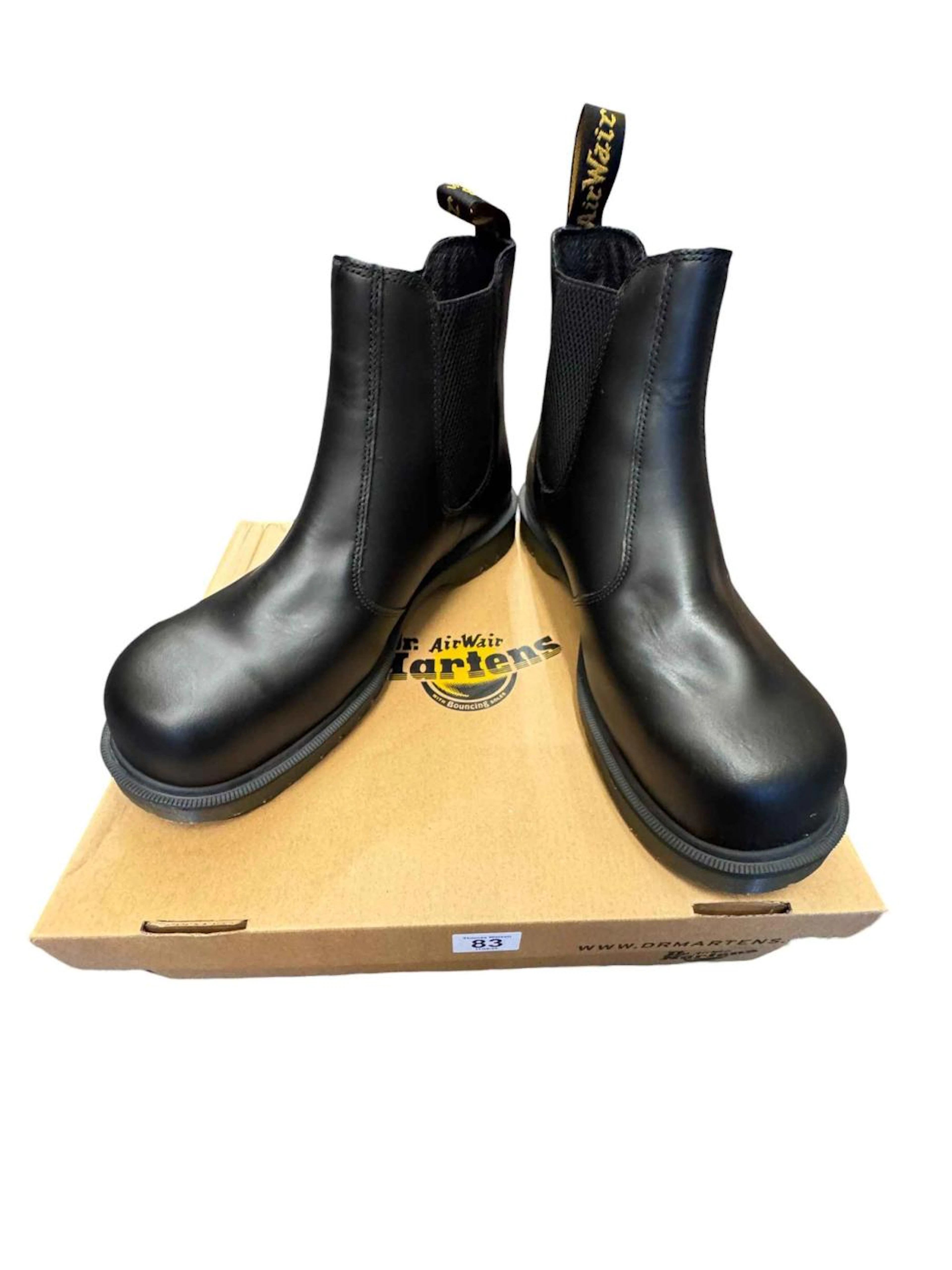 Seven pairs of steel toe capped Dr Martens safety boots, size 11's.