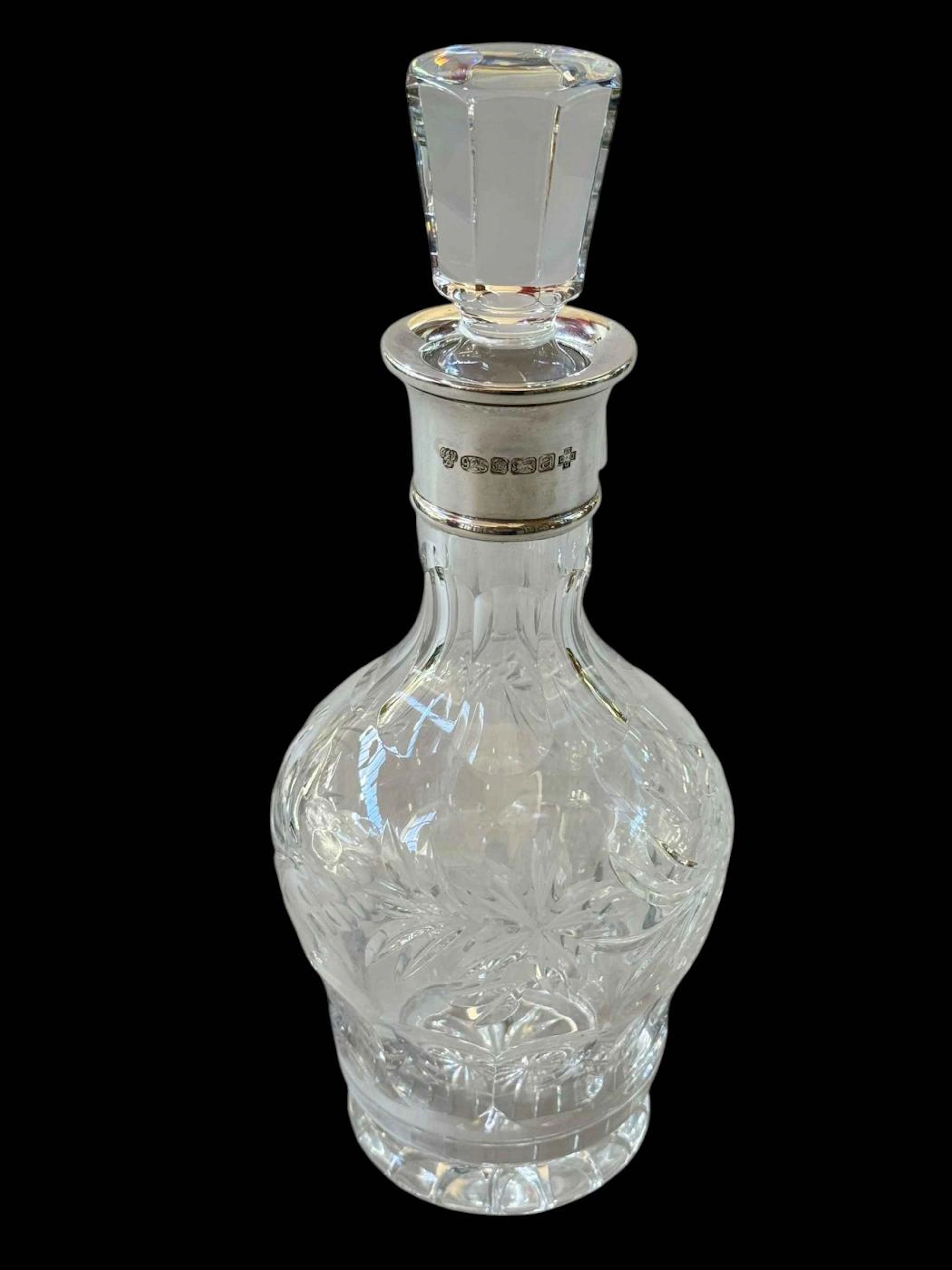 CJ Vander silver mounted crystal decanter.