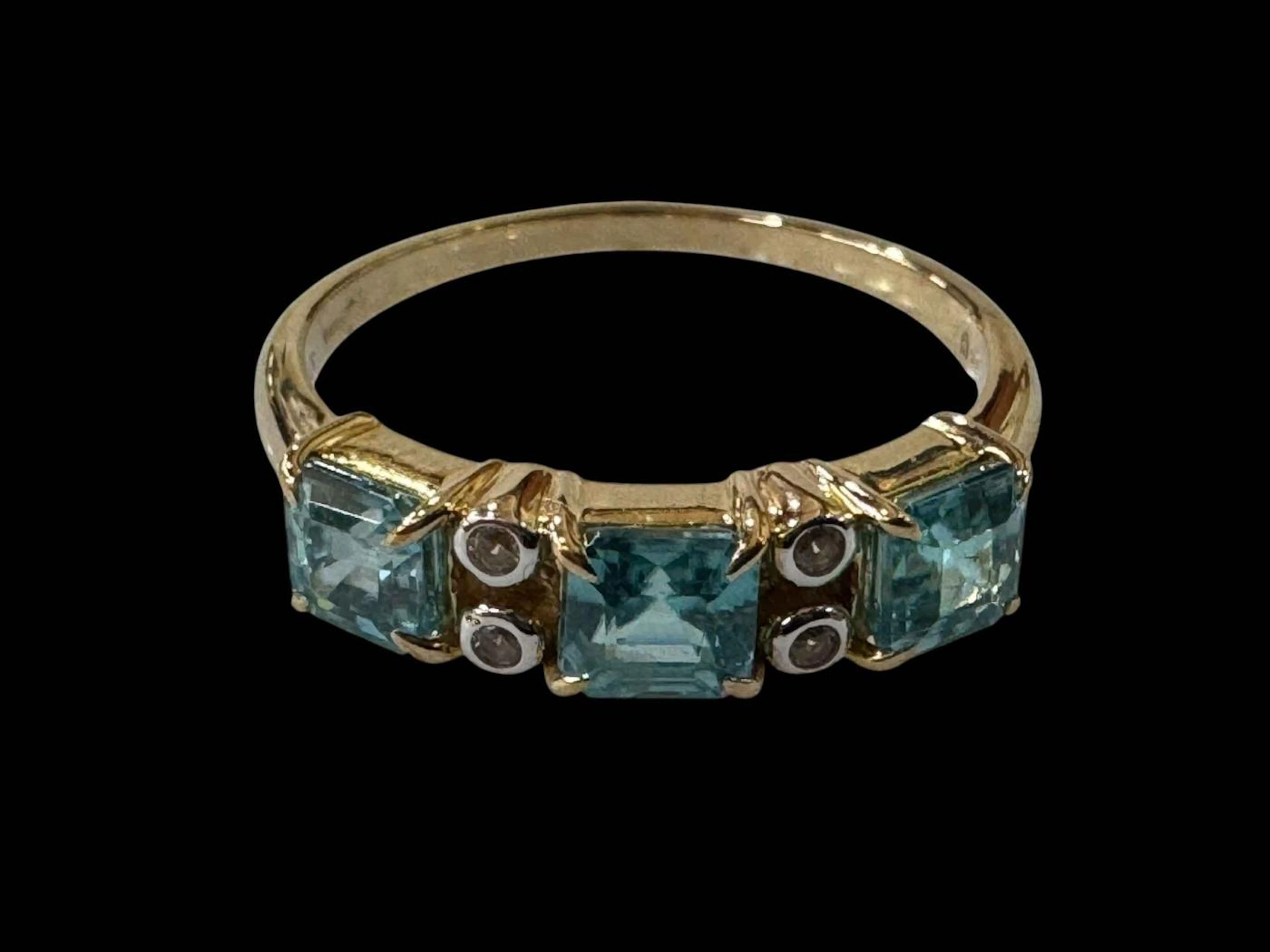 Rutanakir blue and white zircon 9k gold ring, size P/Q, with certificate.