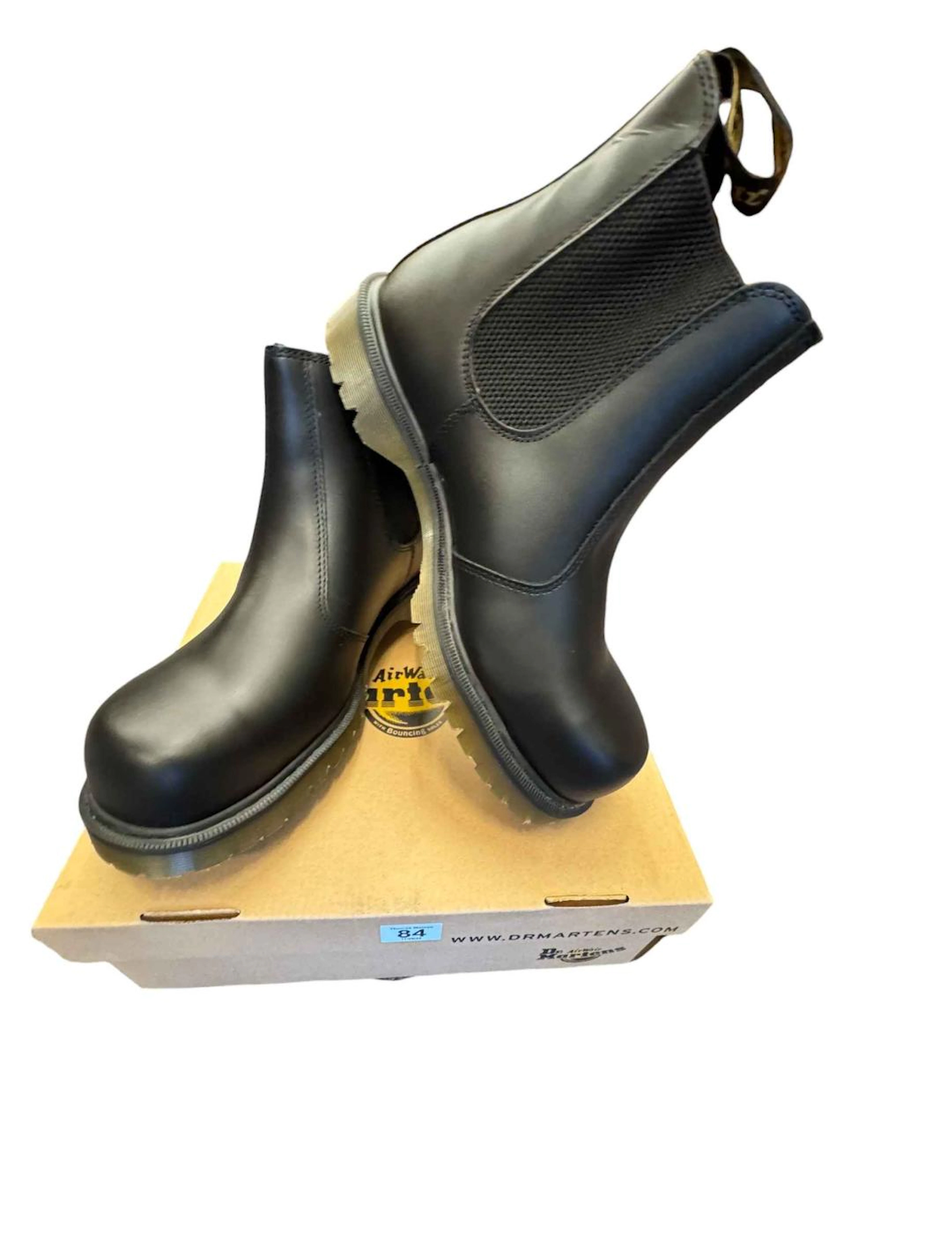 Seven pairs of steel toe capped Dr Martens safety boots, size 11's.
