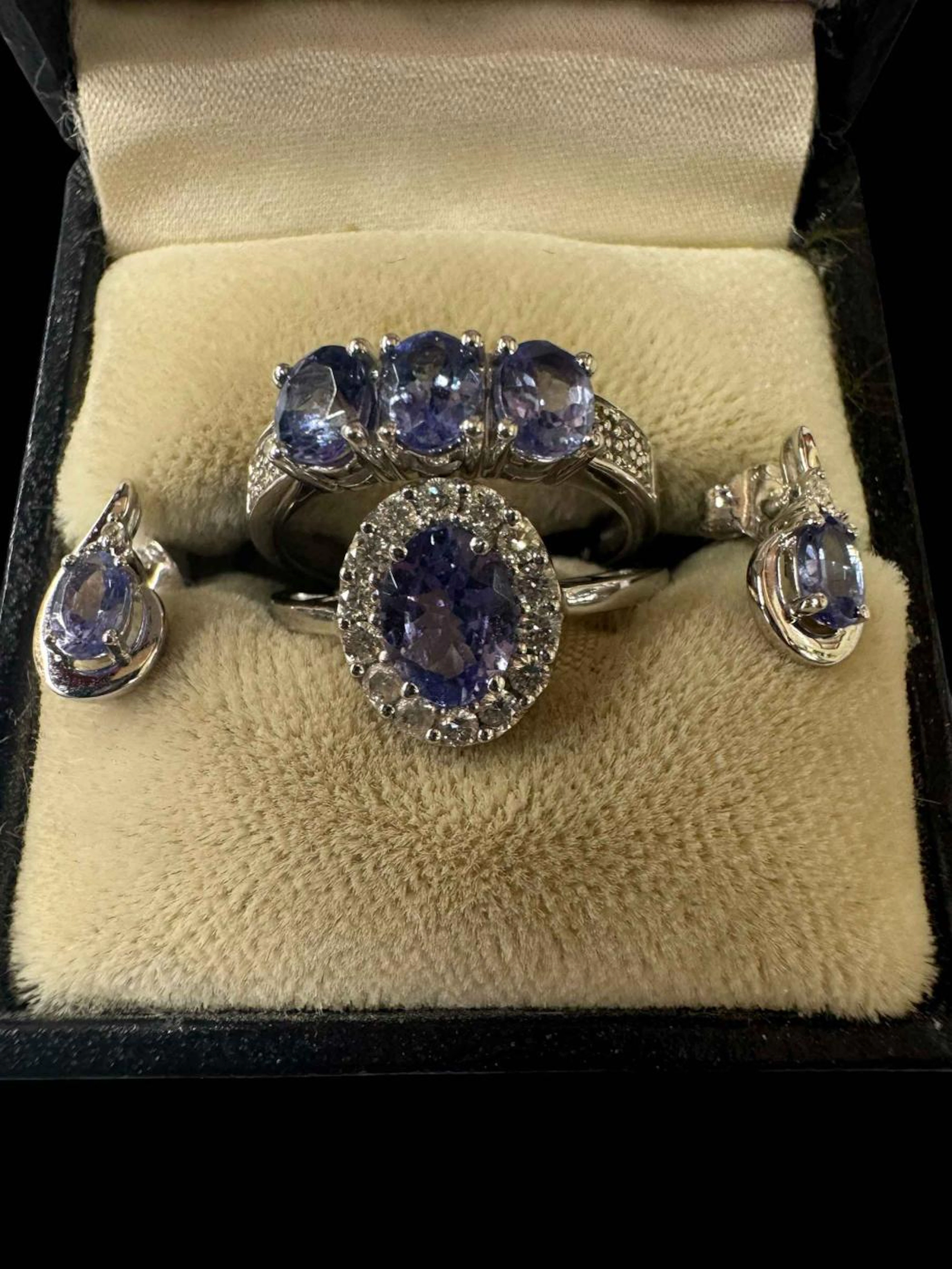 Two tanzanite 9 carat white gold rings, size L, and tanzanite earrings (3).