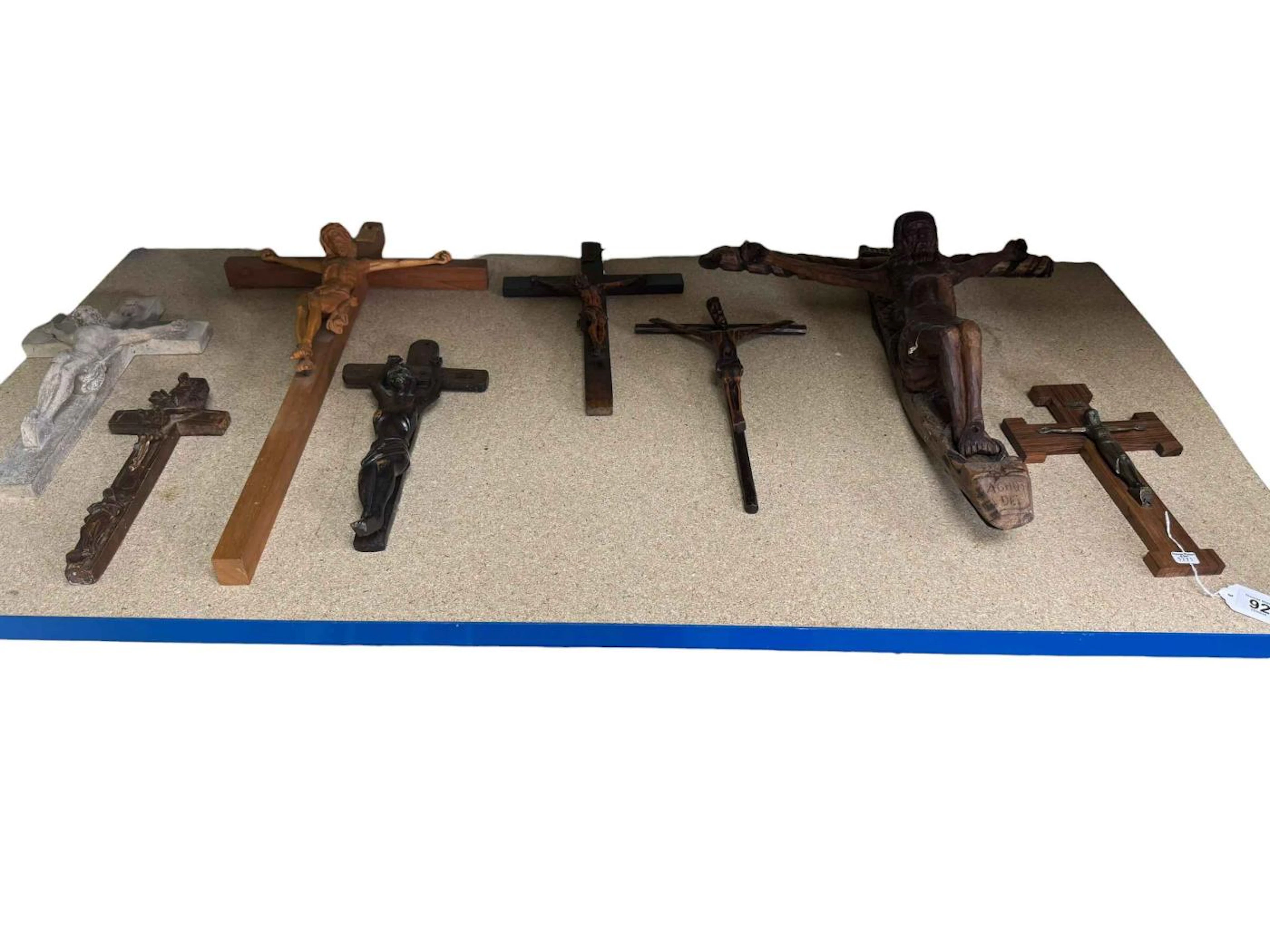 Eight crucifixes.